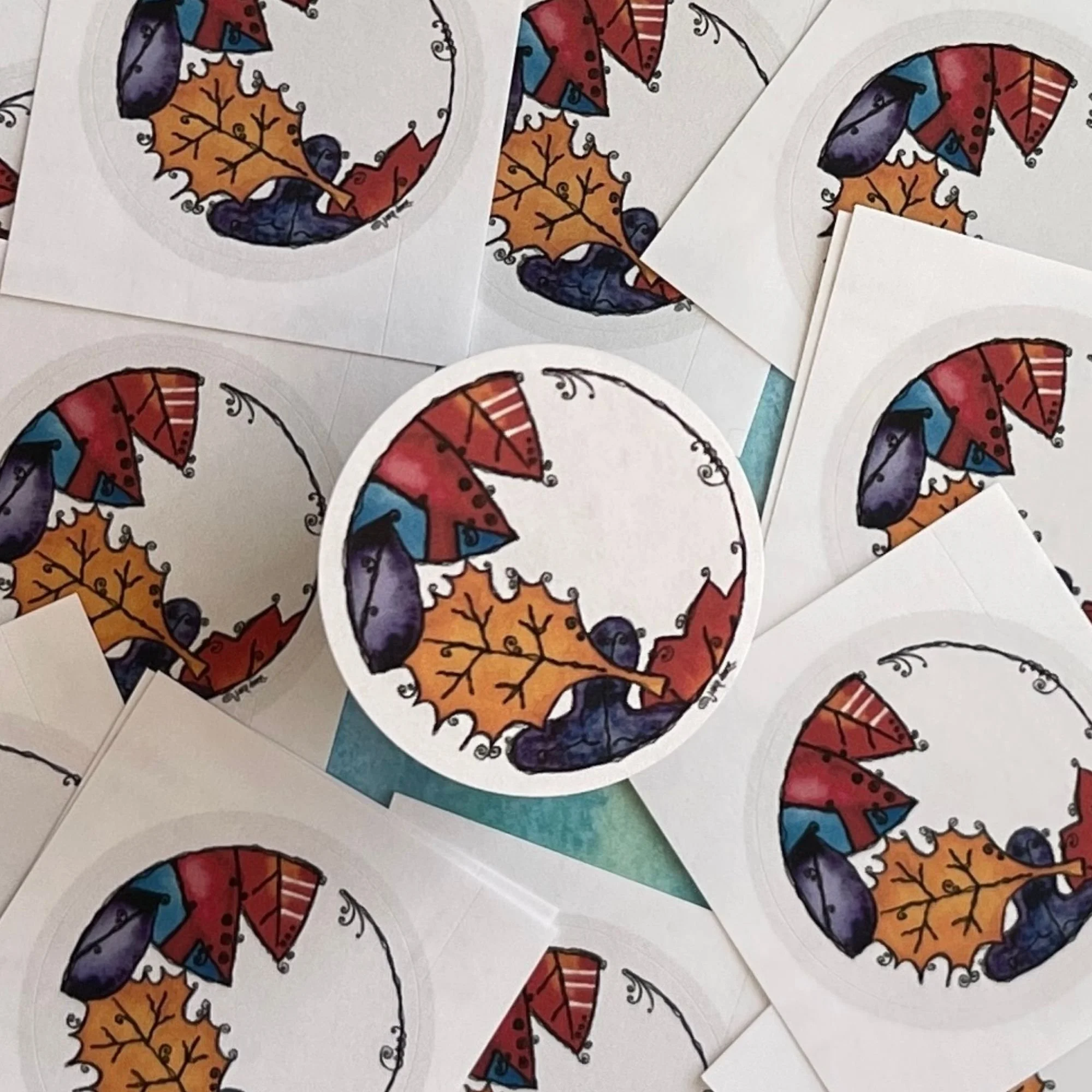 Close-up of Beleaf envelope seal showing detailed leaf textures and whimsical vine line forming an open circle with space for a message