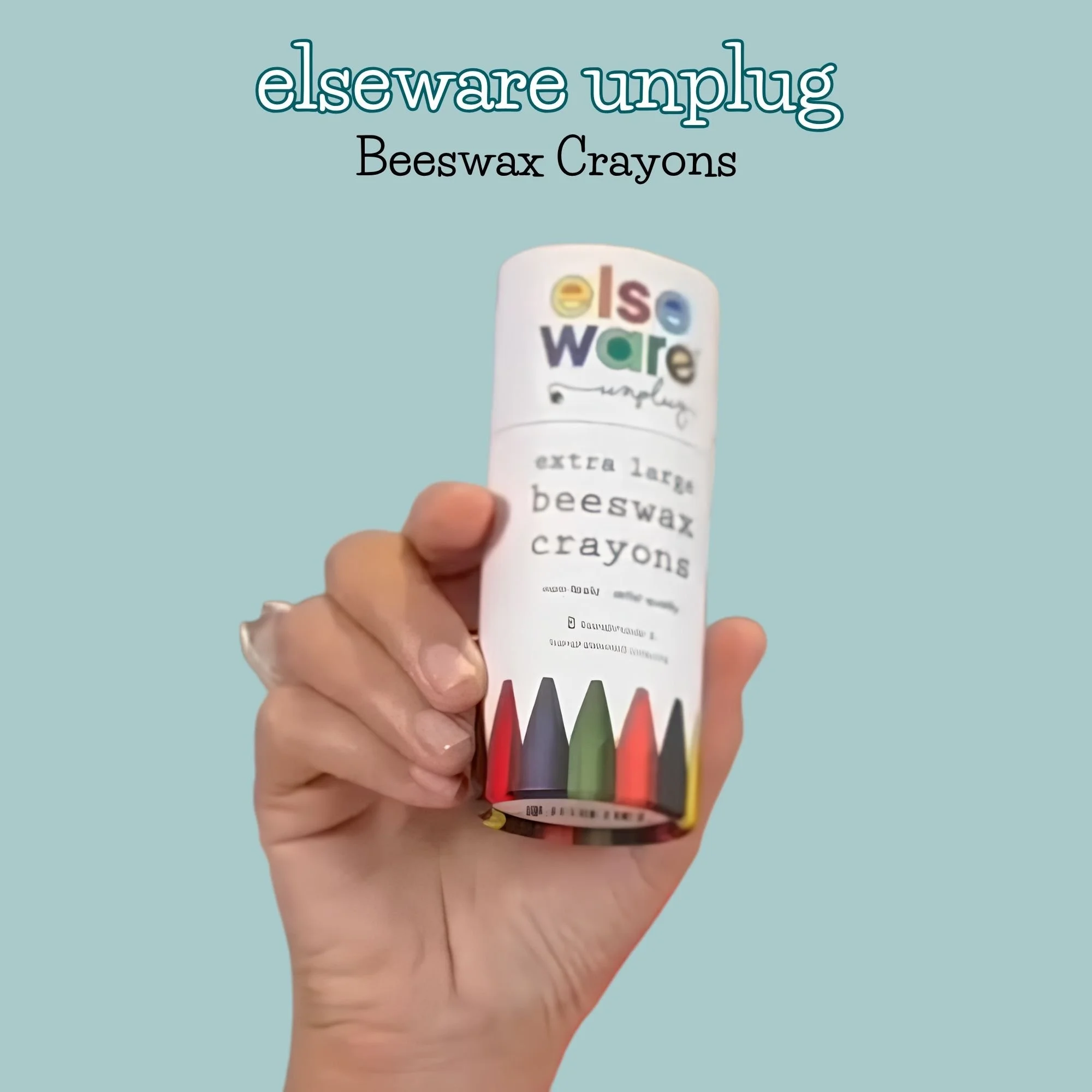 Eight colorful beeswax crayons displayed outside their storage tube for coloring and art projects.