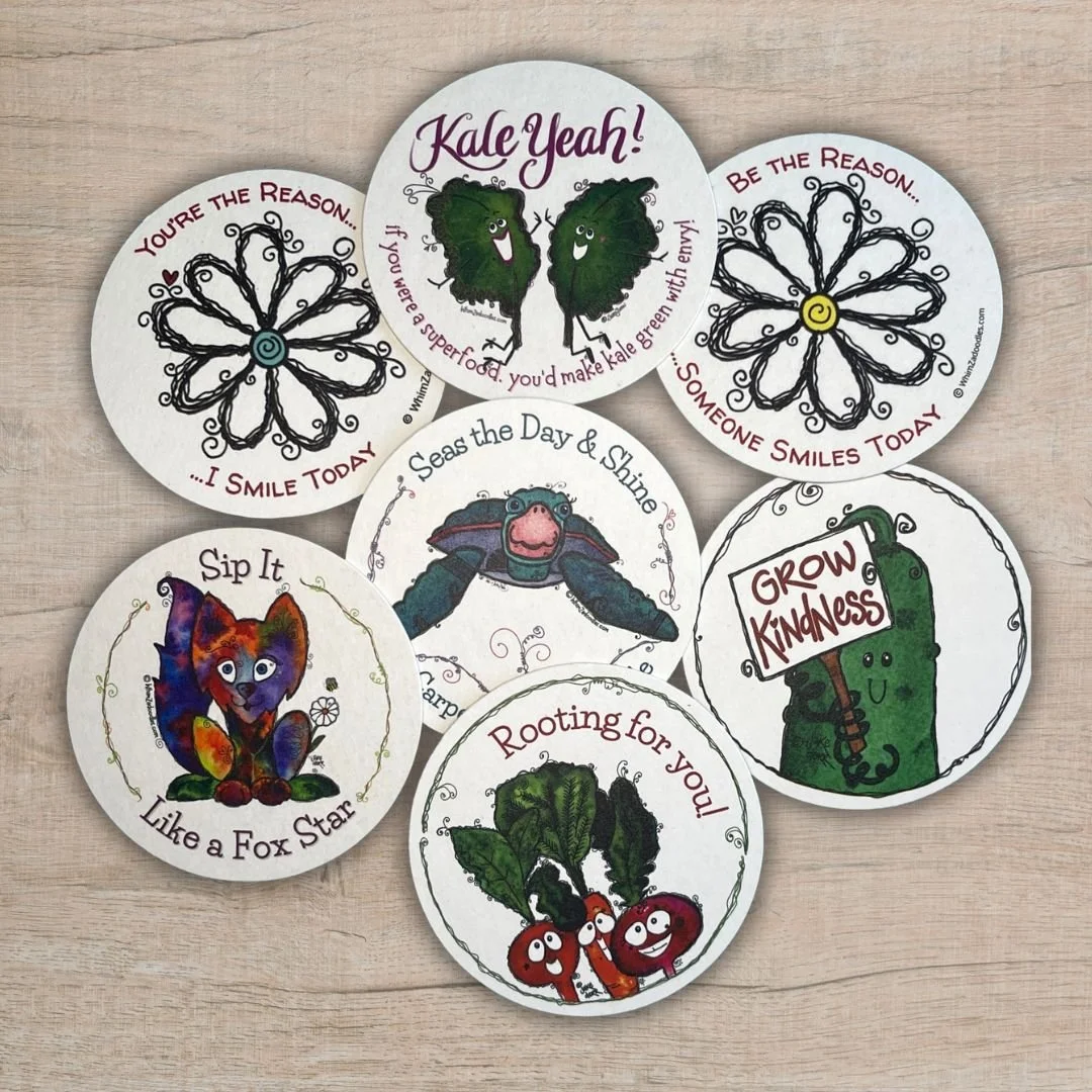 assorted whimsical drink coasters with watercolor vegetables and uplifting messages including grow kindness and rooting for you designs