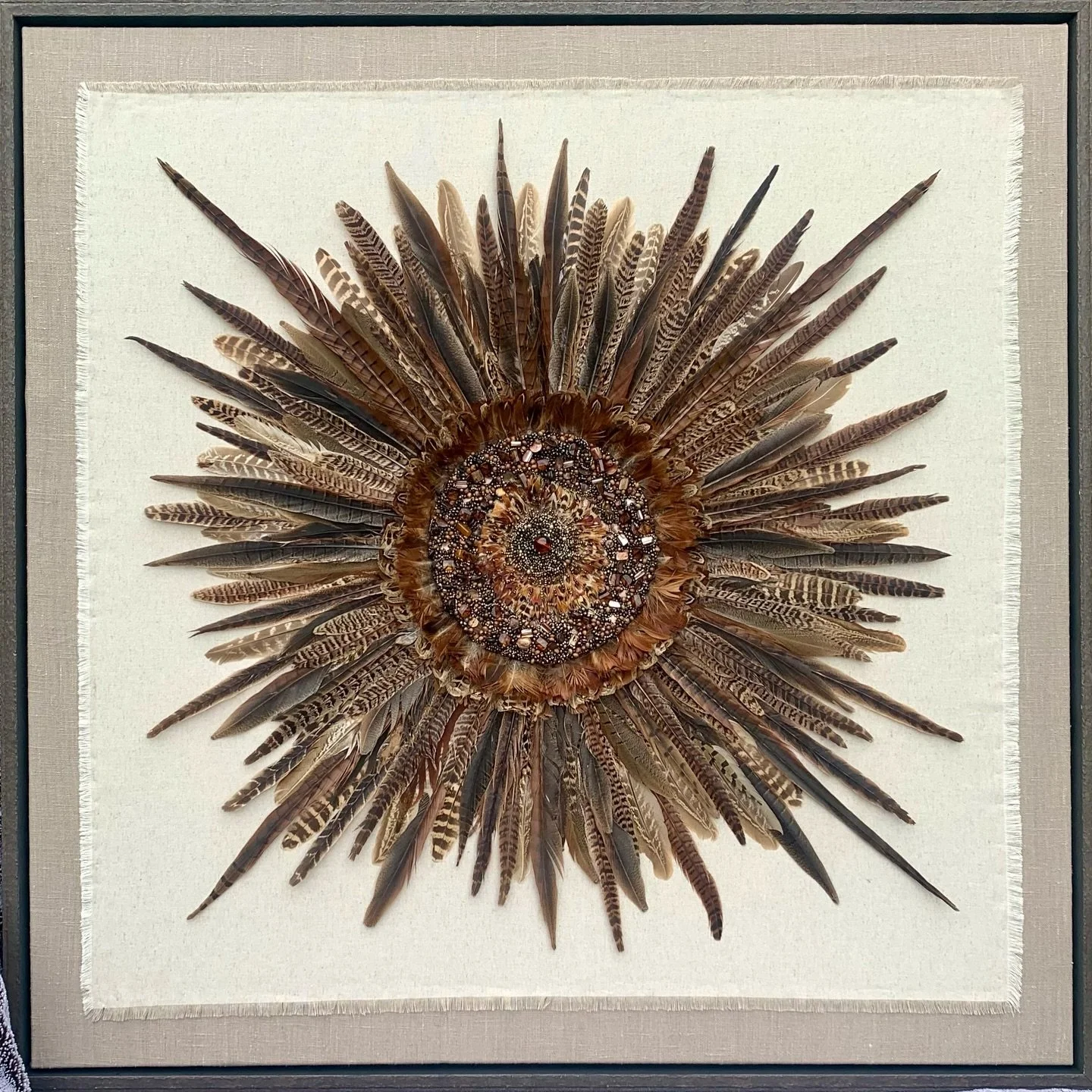 Country Wanders 🪶 a commision piece for a wonderful clients country home in the South Downs! A 1m x 1m pheasant and duck feather with a bespoke intricate hand sewn beaded centre. Framed in a rustic metal inspired wooden frame.

DM me for more info o