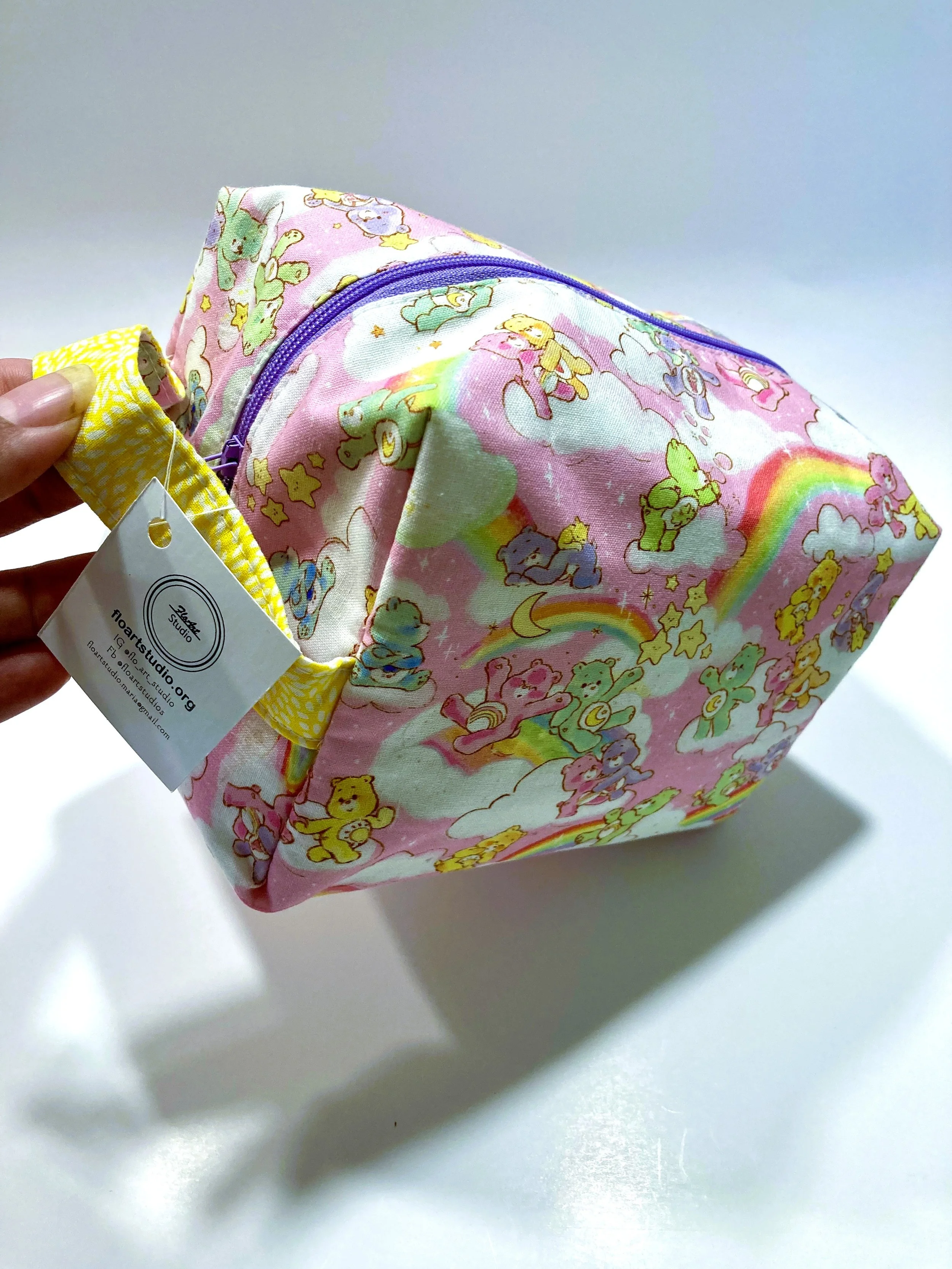 Retro 80s Cartoon Bears Travel Cosmetic Bag with Handle Front Angled View B.jpeg