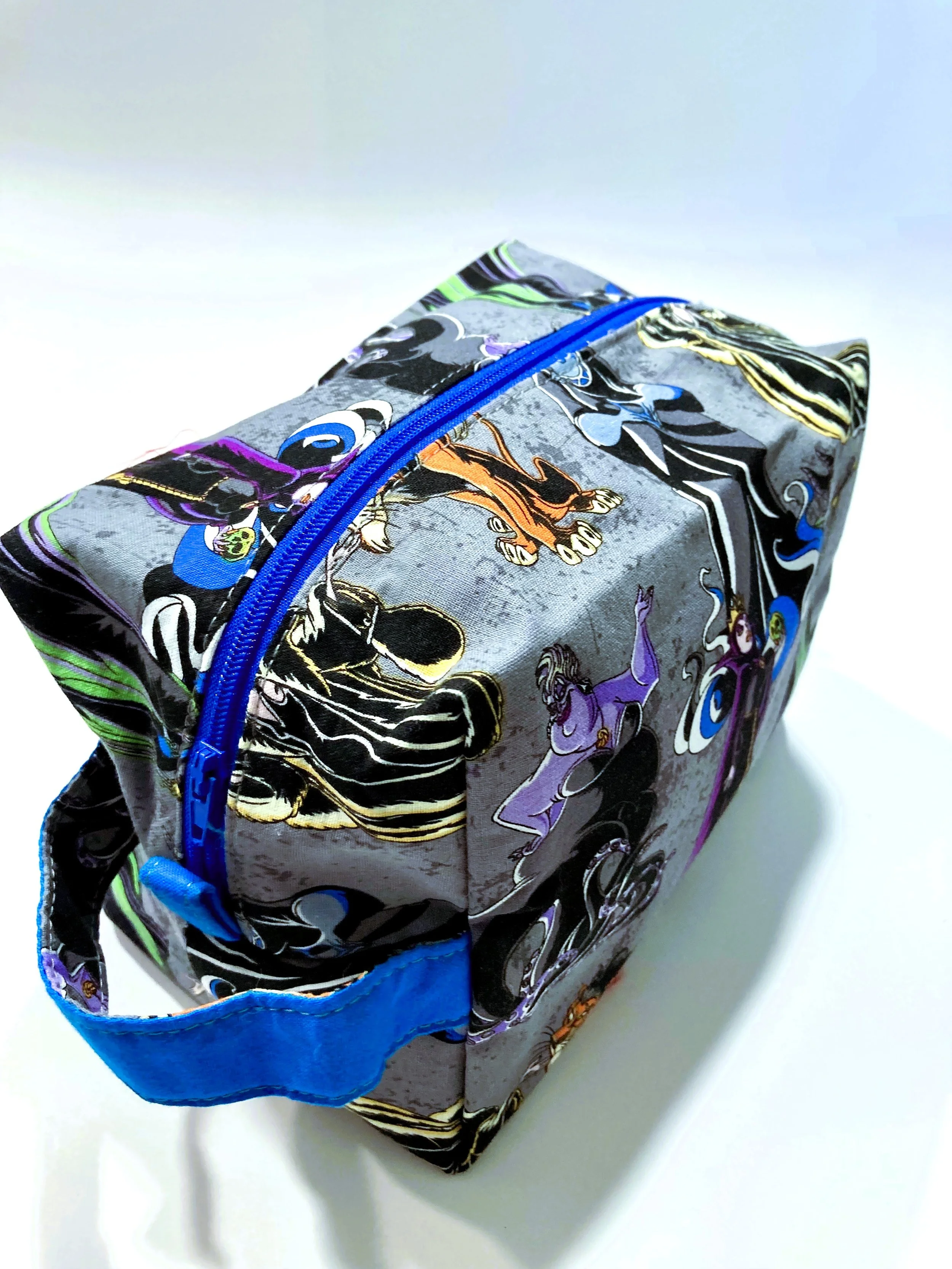 Villains Inspired Travel Cosmetic Bag Dark Fantasy Queen and Witch Makeup Case Front Angle View.jpeg
