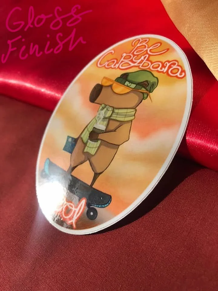 hipster-capybara-skateboard-cool-sticker-gloss.jpg