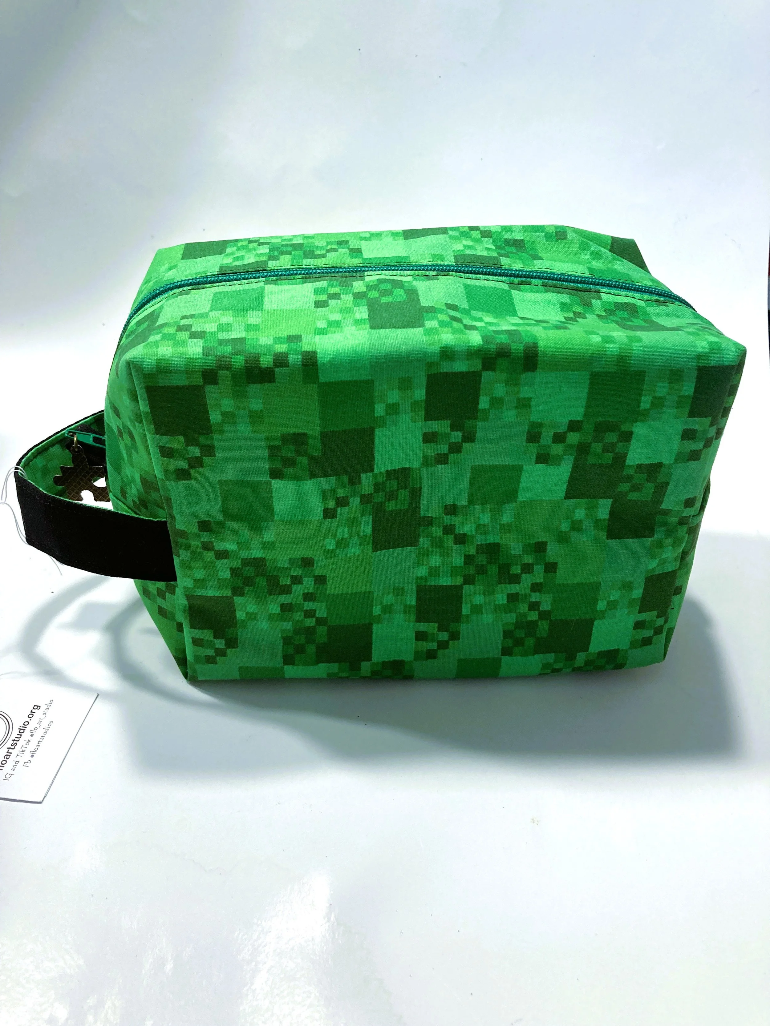 Pixel Block Travel Cosmetic Bag 8-Bit Gaming Makeup Case and Tech Organizer Front View.jpeg