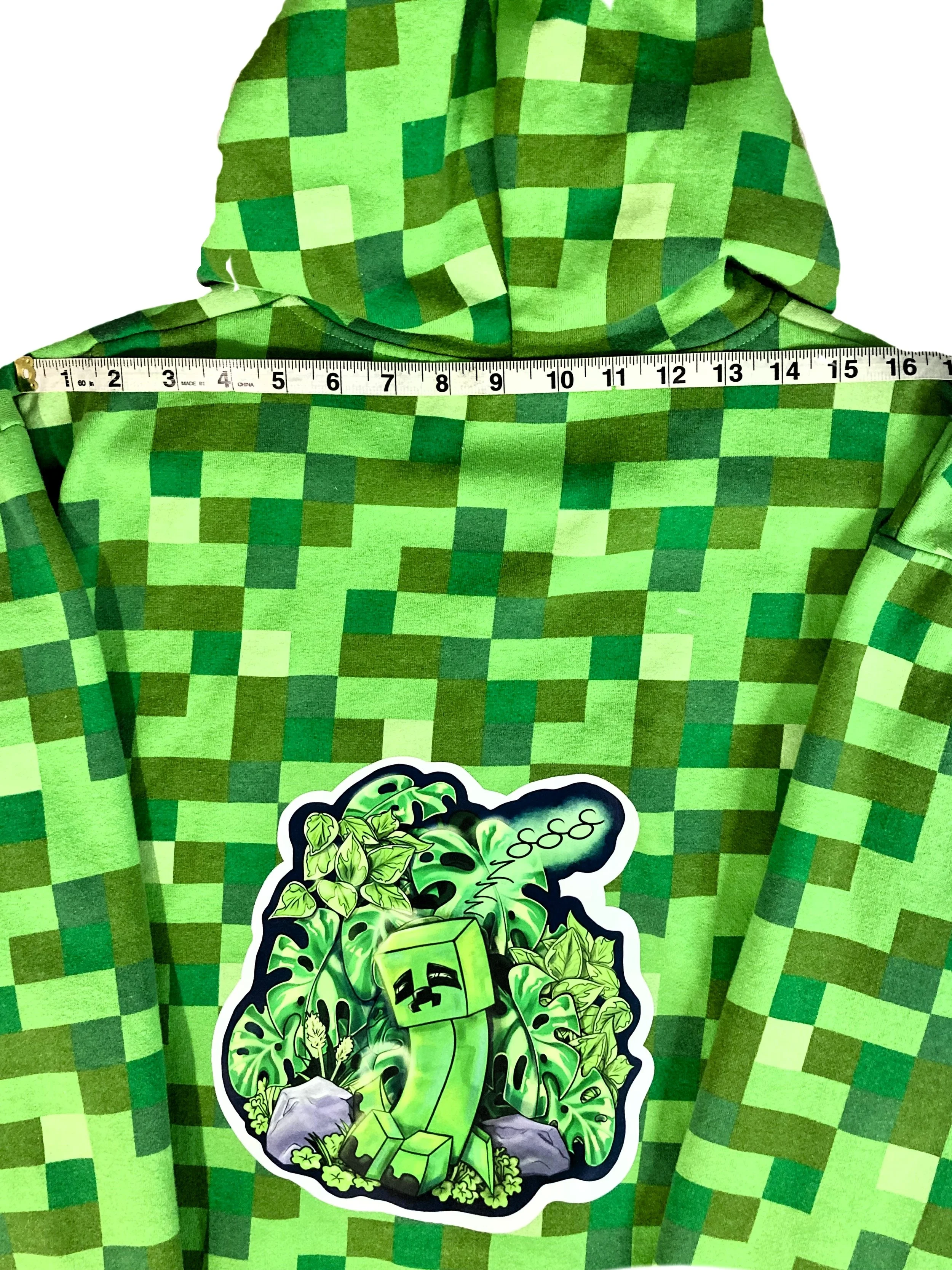 Upcycled Reworked Green Pixel Monster Gamer Hoodie Demensions Across Shoulders.jpeg