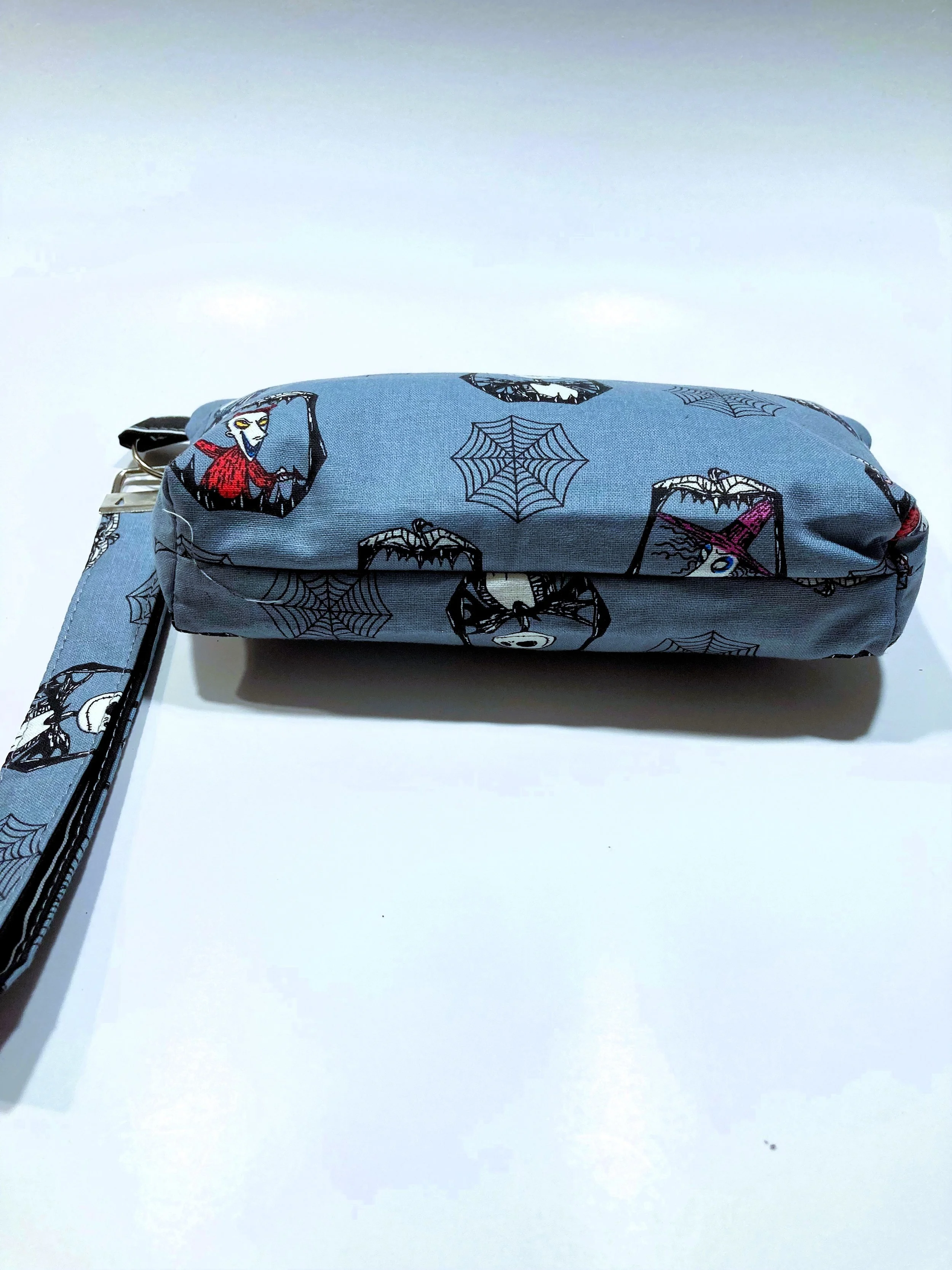 Spooky Town Citizen Zip Wristlet Gothic Fantasy Ensemble Cosmetic Bag Bottom View.jpeg