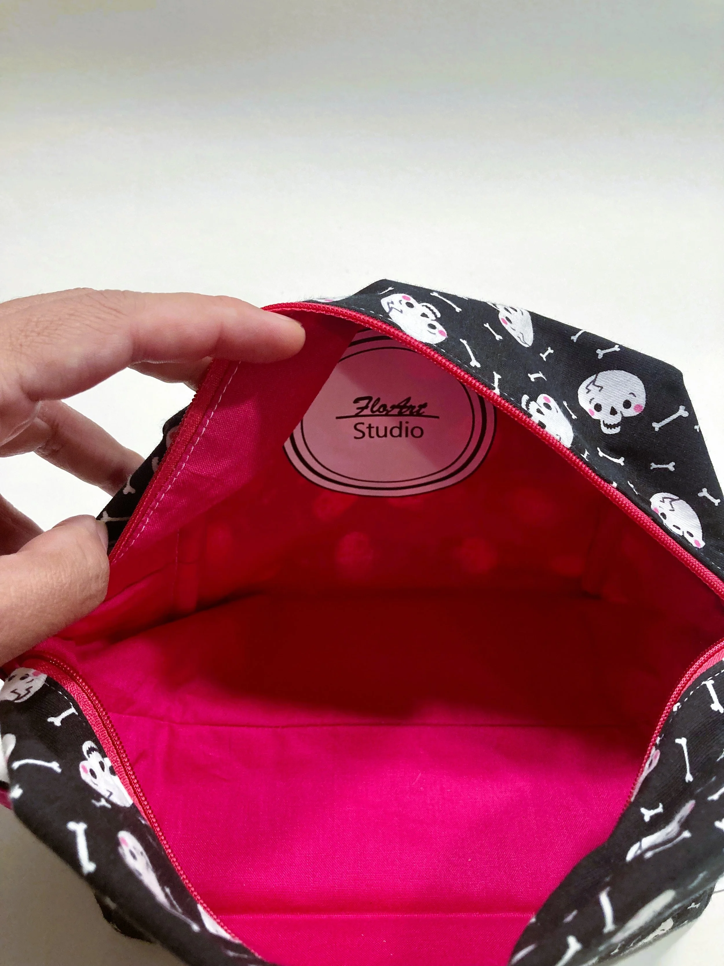 Creepy Cute Skull and Bones Travel Cosmetic Bag Pastel Goth Coquette Pink Bows Makeup Case Interior View.jpeg