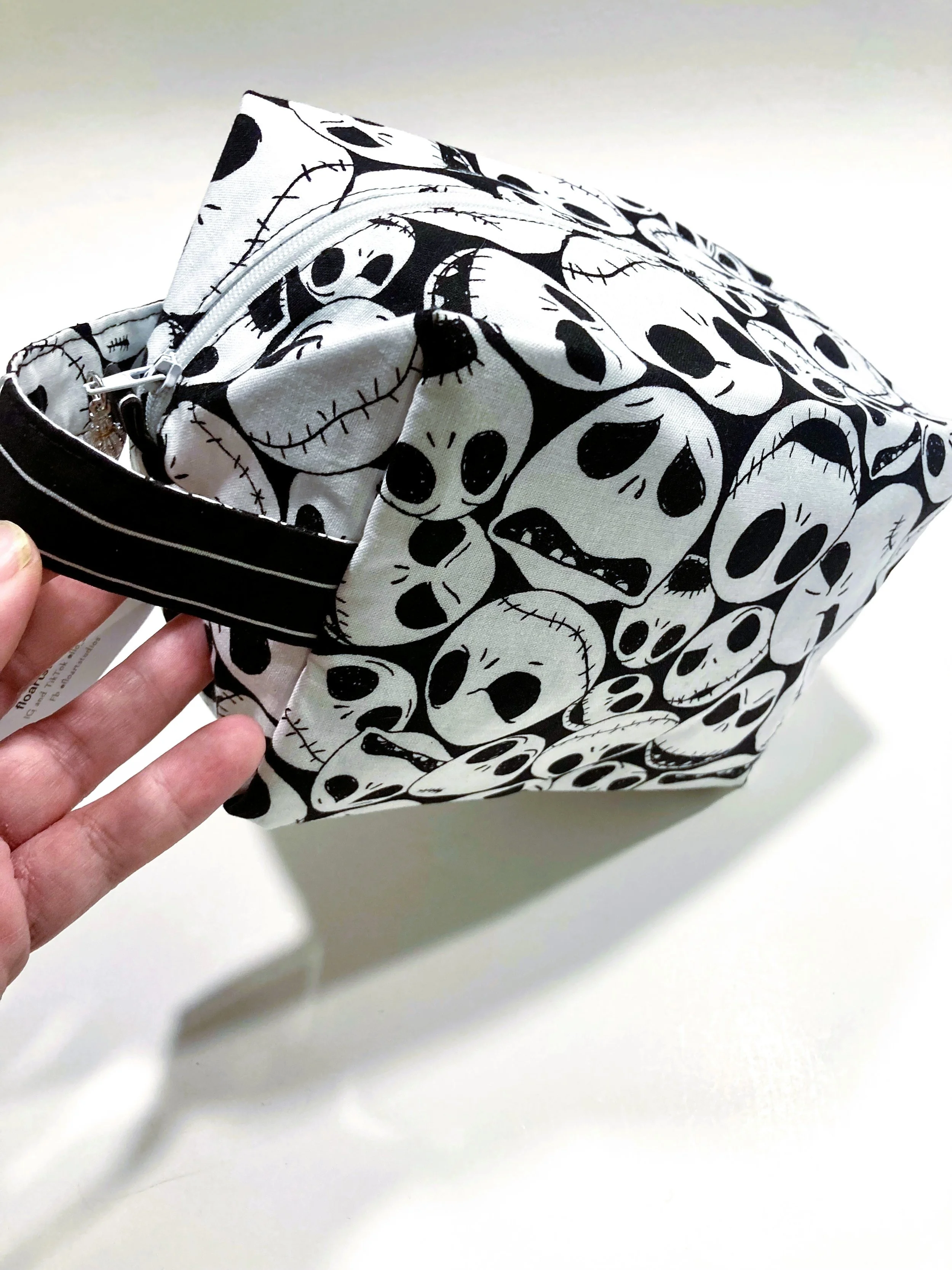 Monochrome Skeleton King Travel Cosmetic Bag Black and White Gothic Front Angle View.jpeg