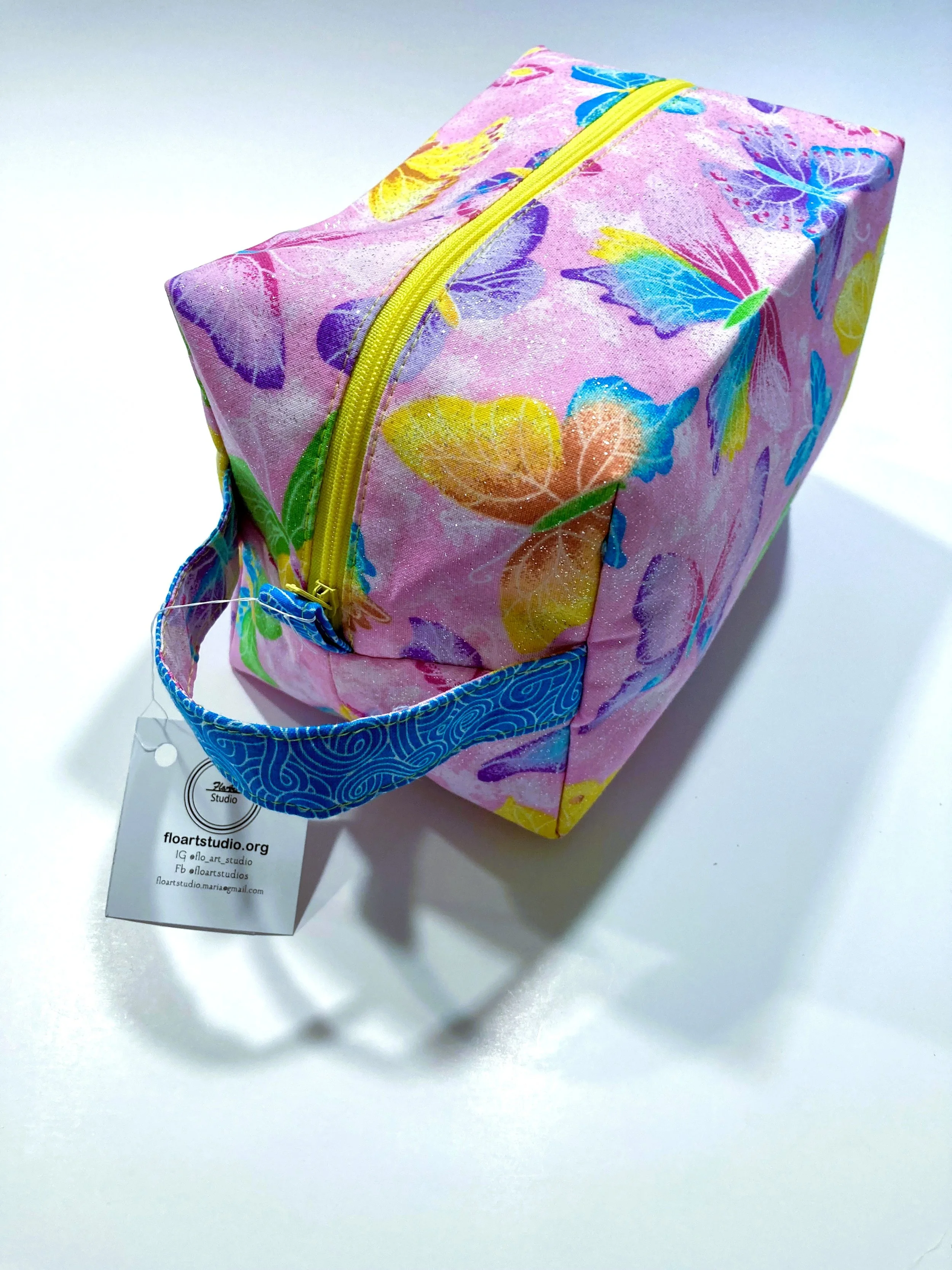Shimmer Pink Butterfly Cosmetic and Travel Bag Vibrant Makeup Case Side Angle View.jpeg