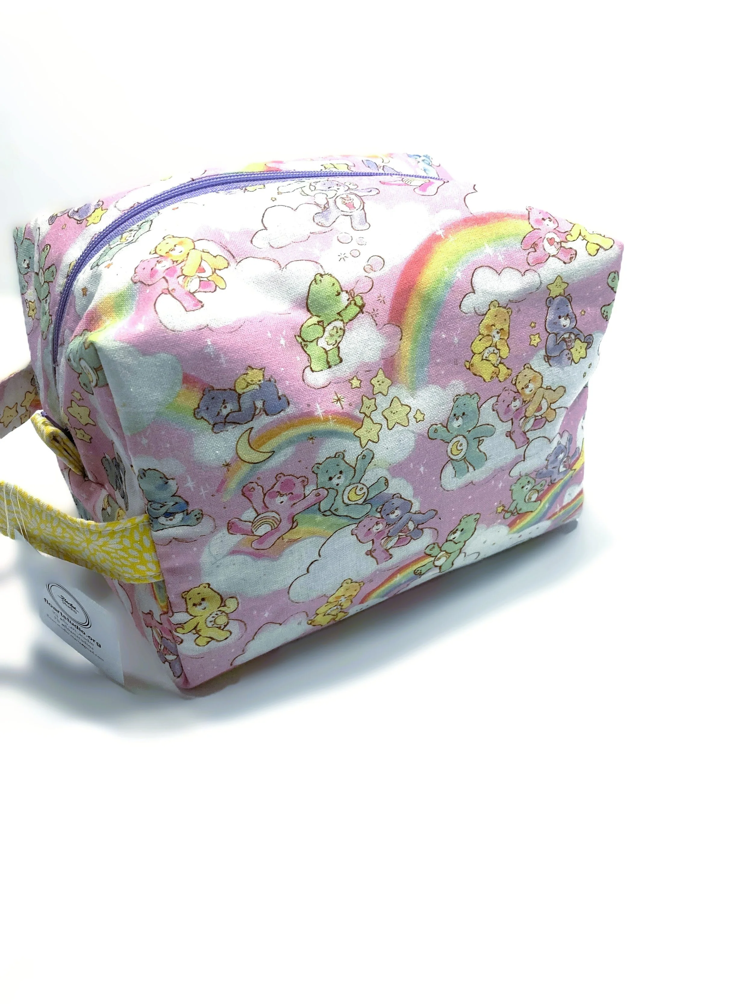 Retro 80s Cartoon Bears Travel Cosmetic Bag with Handle Front Angled View.jpeg