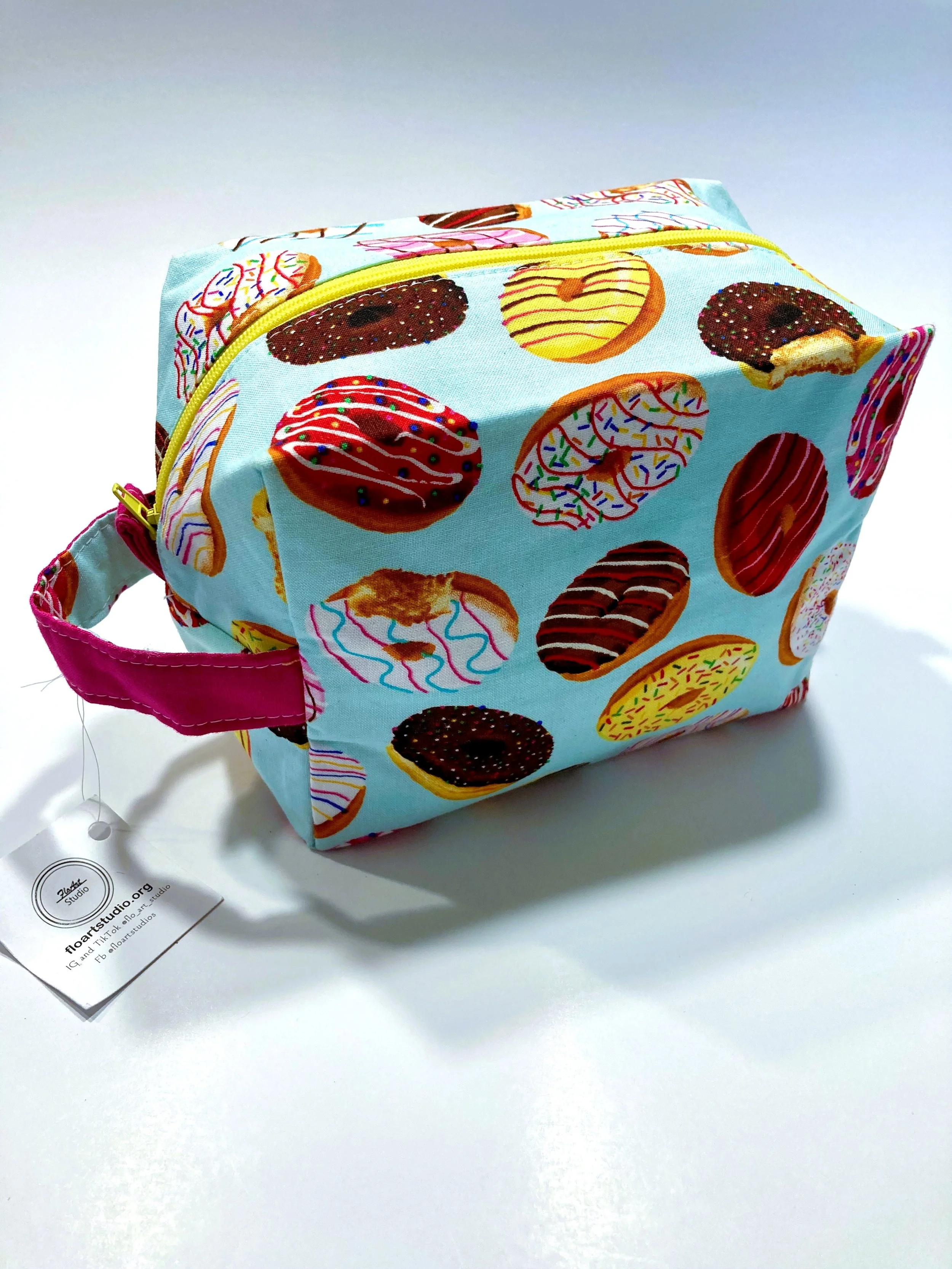 Bright Donuts Print Travel Cosmetic Bag | Vibrant Sprinkle Pattern Makeup Case with Hot Pink Interior