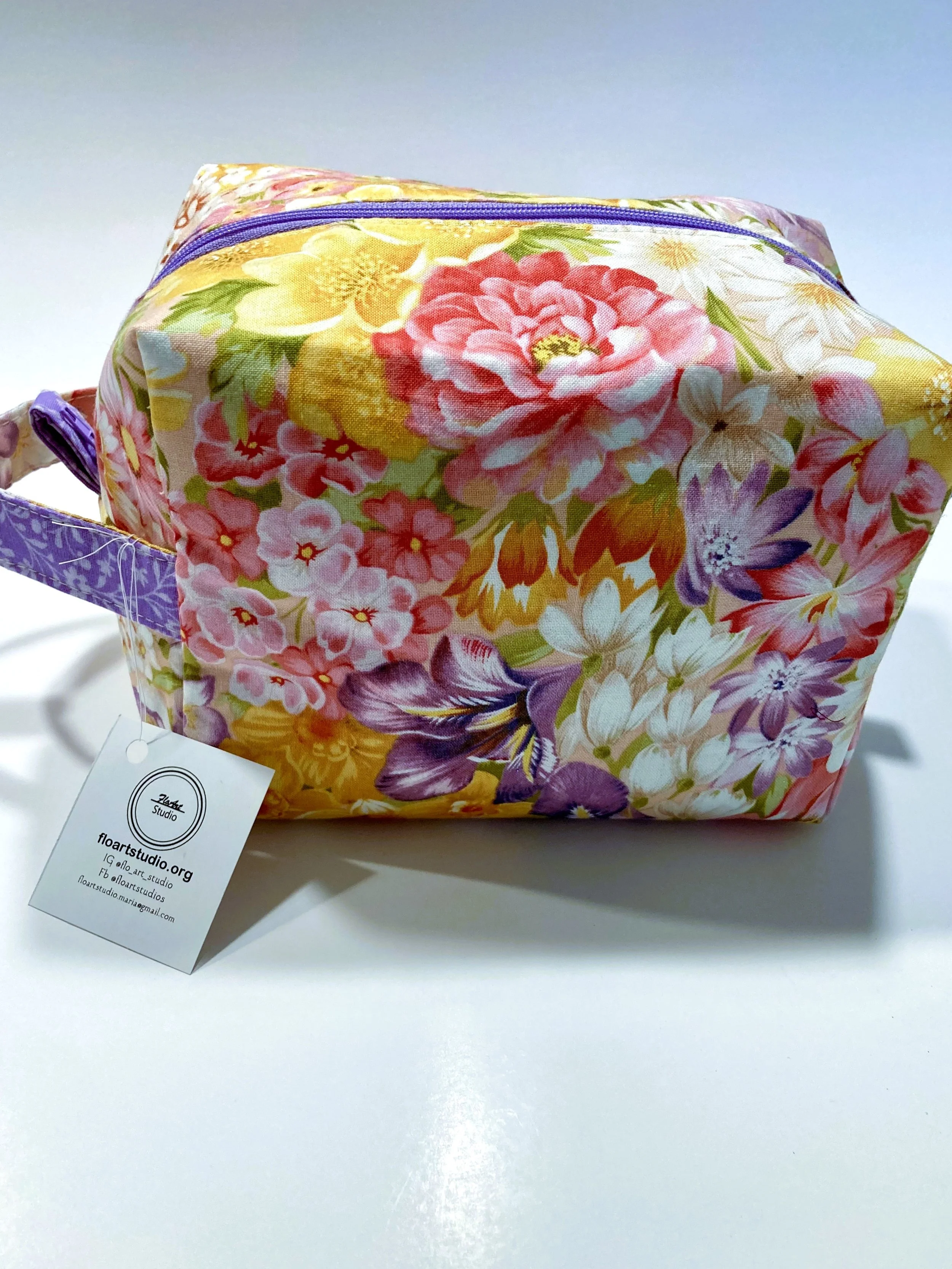 Cottagecore Bright Spring Flowers Travel Cosmetic Bag Pastel Wildflower Print Botanical Makeup Case Front View.jpeg