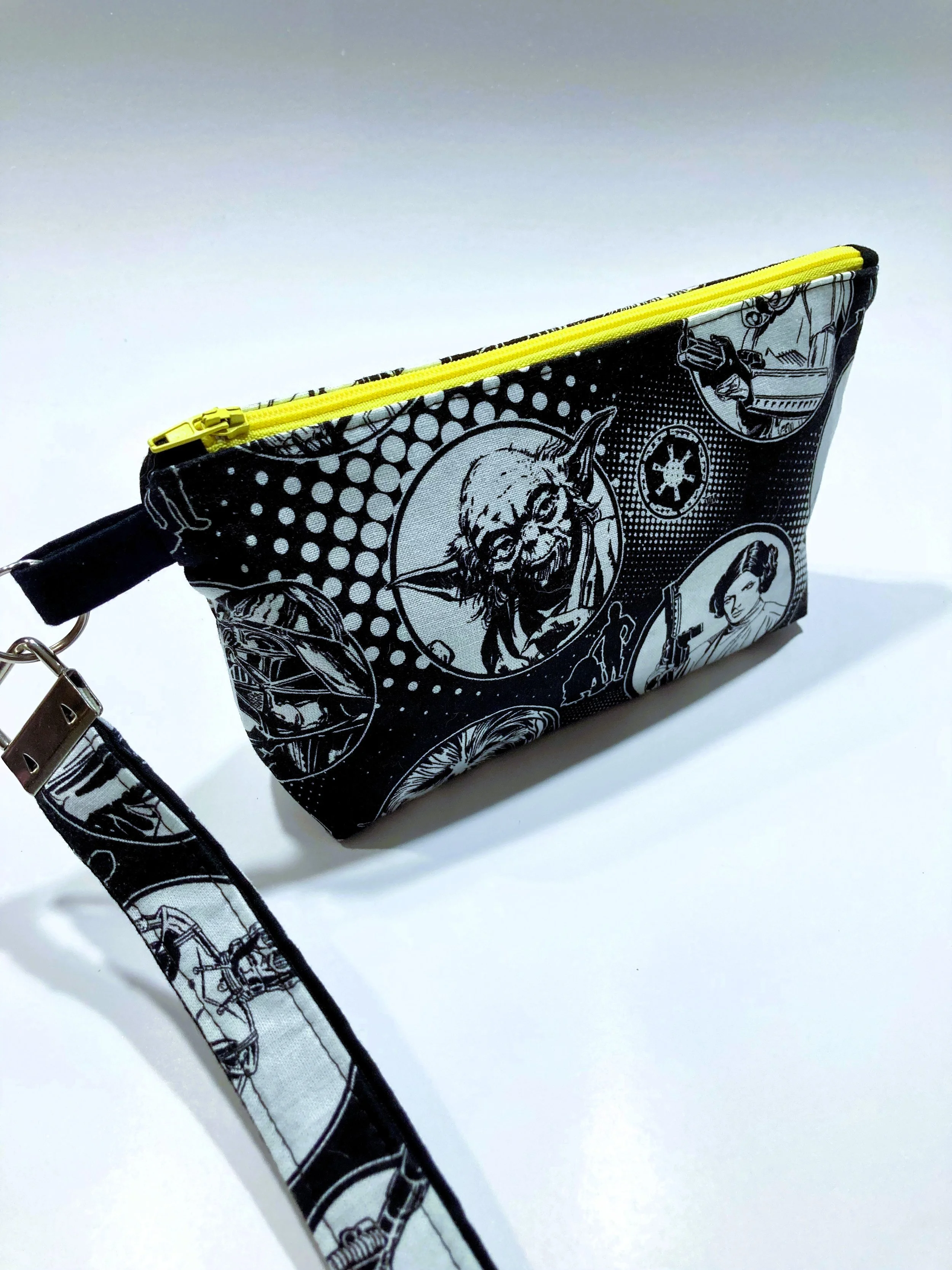 Star Wars Inspired Zip Wristlet Black and White Monochrome Cosmetic Bag Side Angle View.jpeg