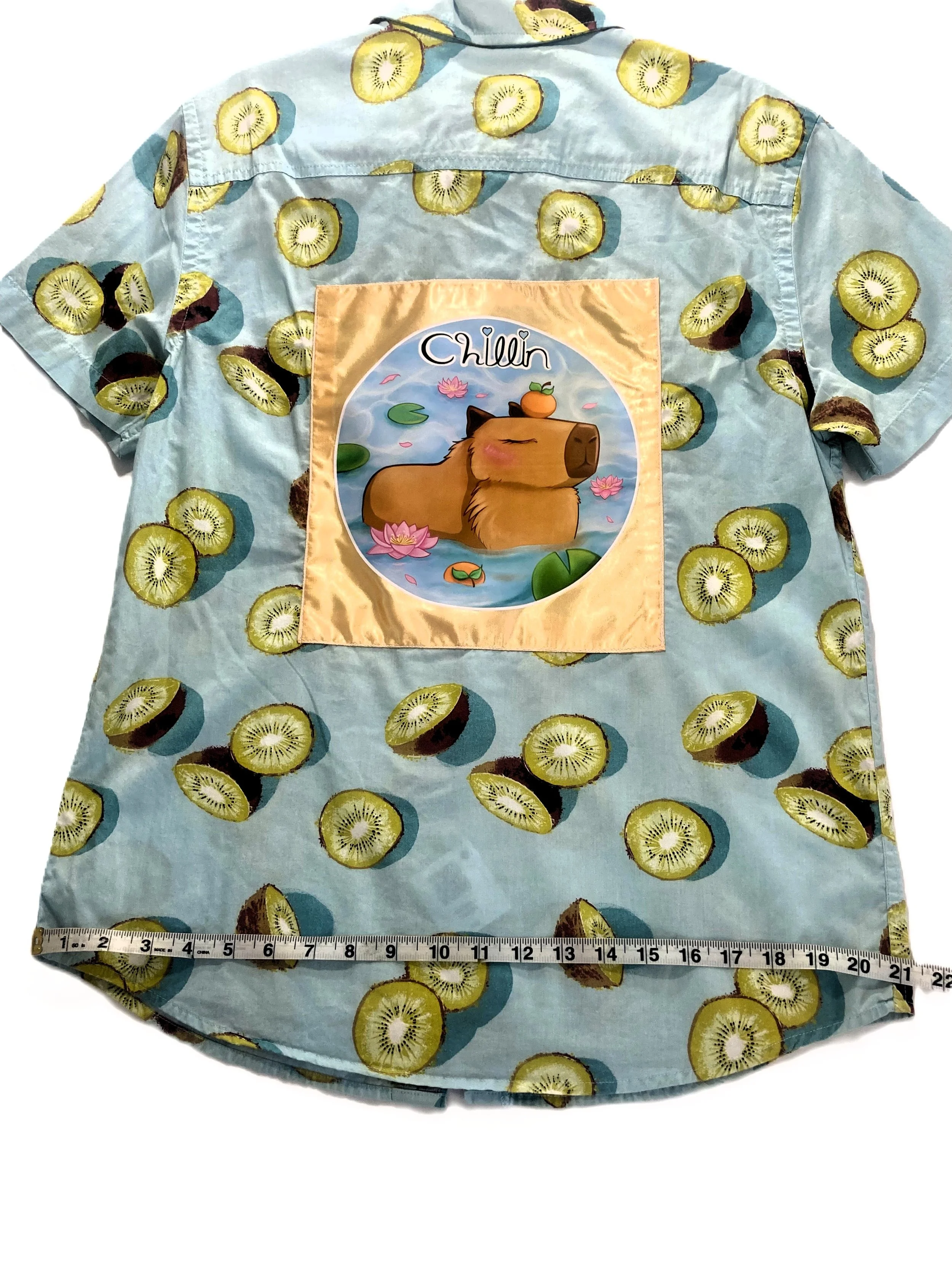 Upcycled Reworked Button Short Sleeve Kiwi Shirt Chillin Cute Cappybara Custom Artwork Demensions Across Base.jpeg