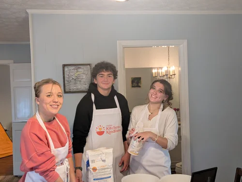 Kitchen of Kindness volunteers cooking