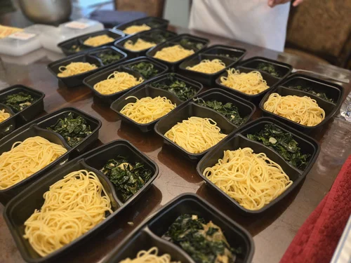 Kitchen of Kindness volunteers cooking