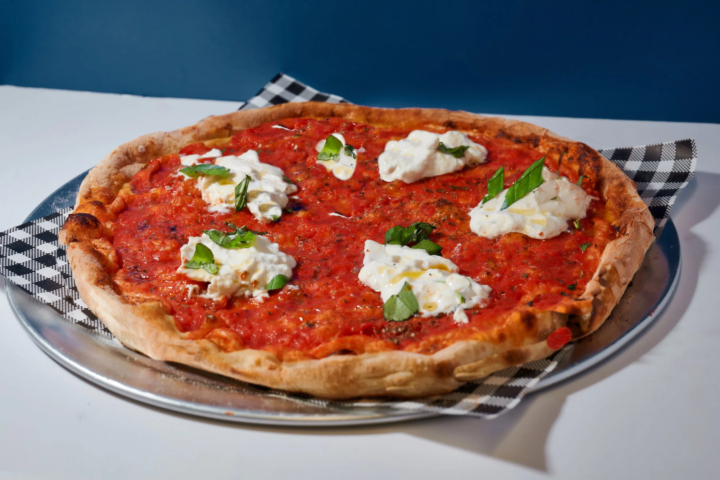 Burrata Pie with tomato sauce, burrata, oregano, fresh basil