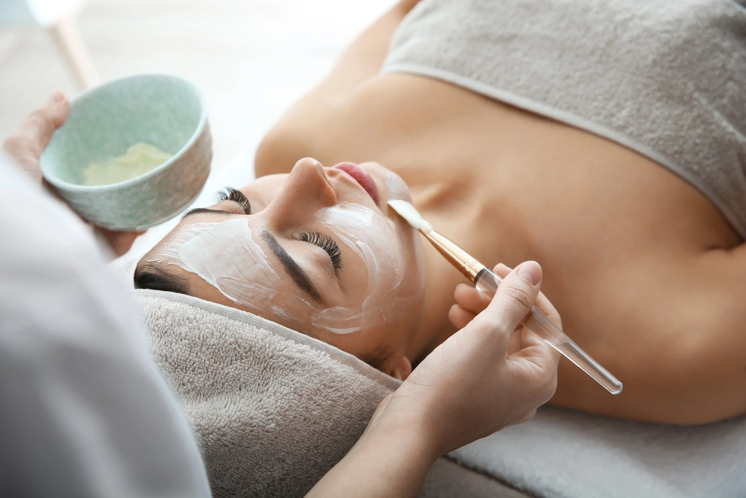 Client enjoying a customized facial for radiant, glowing skin at Lakeside Skin & Laser, South Okanagan