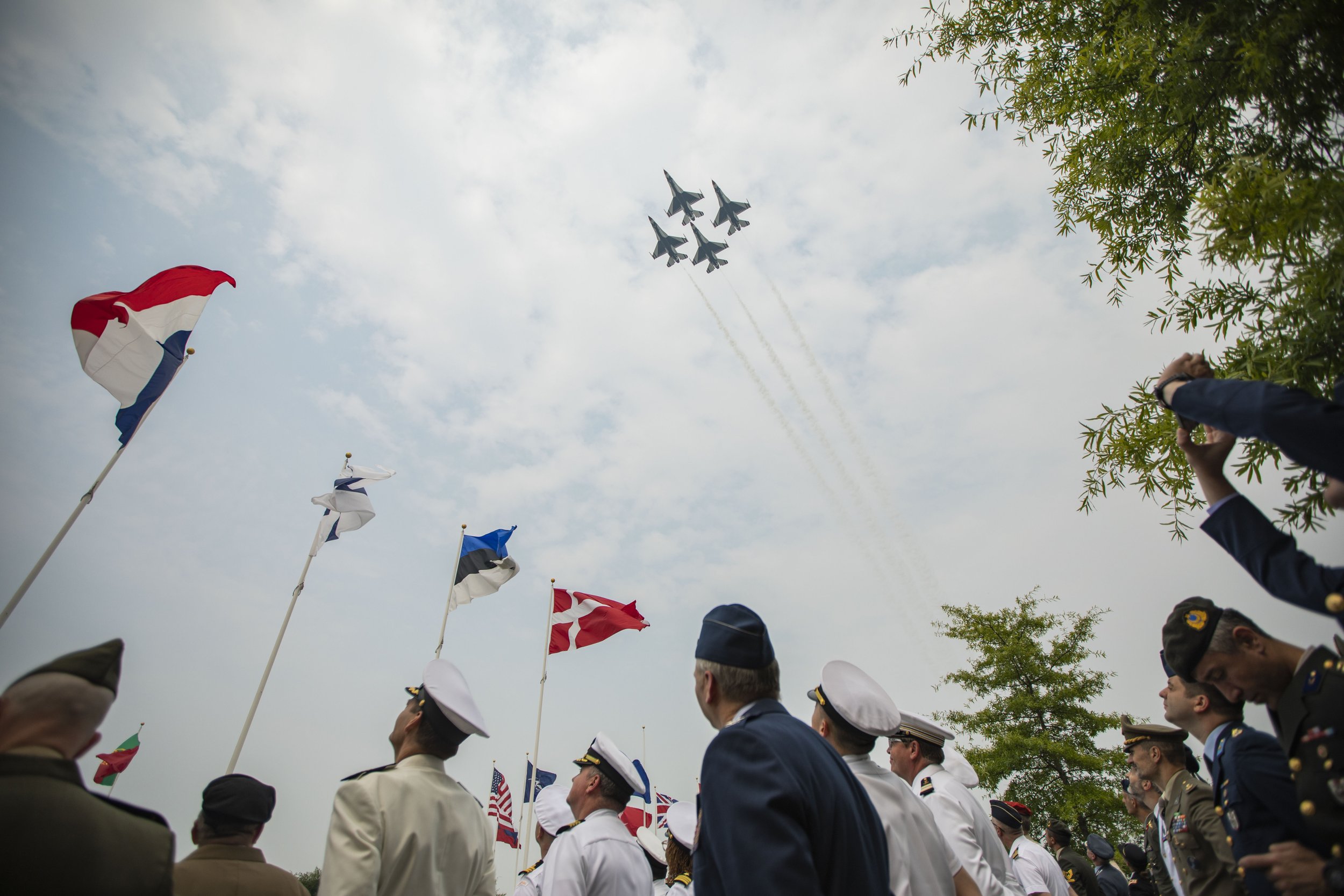  NATO officials watch as the U.S. Air Force Thunderbirds flyover in celebration of NATO's Norfolk headquarters 20th Anniversary on Wednesday, June 7, 2023 in Norfolk, Va. Leadership showcased the Allied Command Transformation's work with an exhibit h