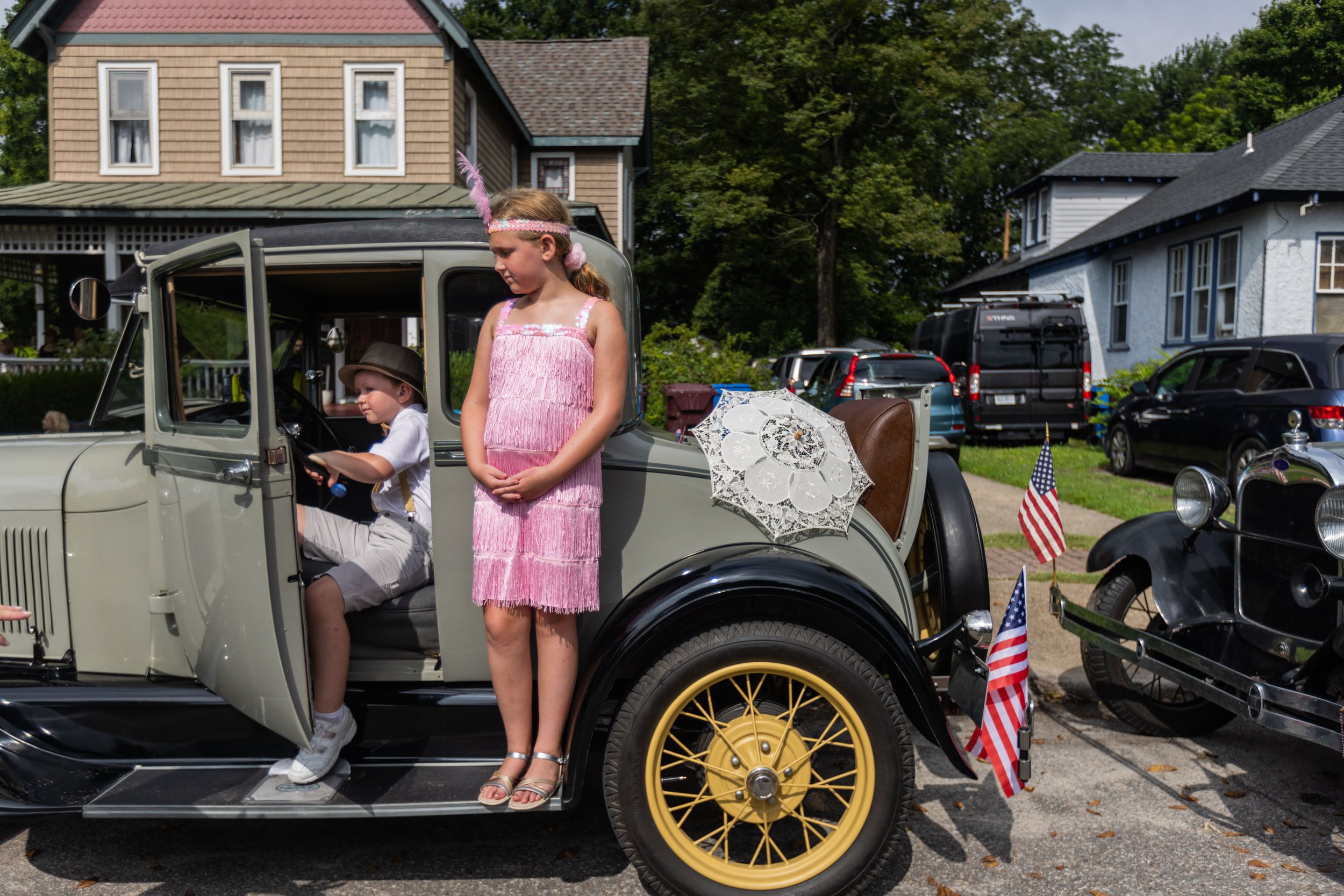  Aiden McCoy, 6, left, and sister Alaina McCoy, 9, prepare to ride in their parents’ Model A as members of the Cape Henry Model A Ford Club in the South Norfolk July 4th Parade hosted by The South Norfolk Civic League and the Chesapeake Parks, Recrea