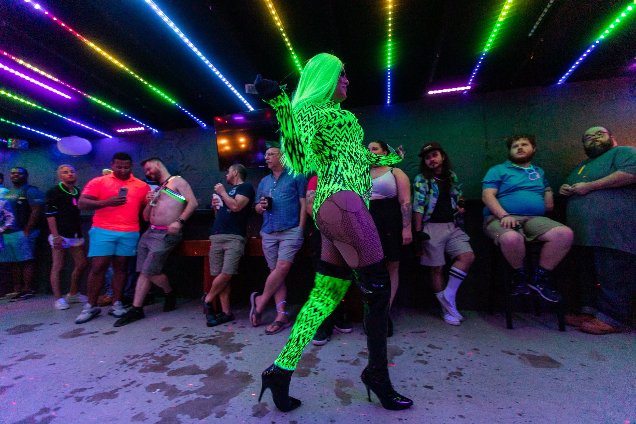  Hampton Roads drag queen Chanel performs at a Neon Bear Glow Party at MJ’s Tavern in Norfolk, Va. on Saturday, June 17, 2023. (Tess Crowley / The Virginian-Pilot) 