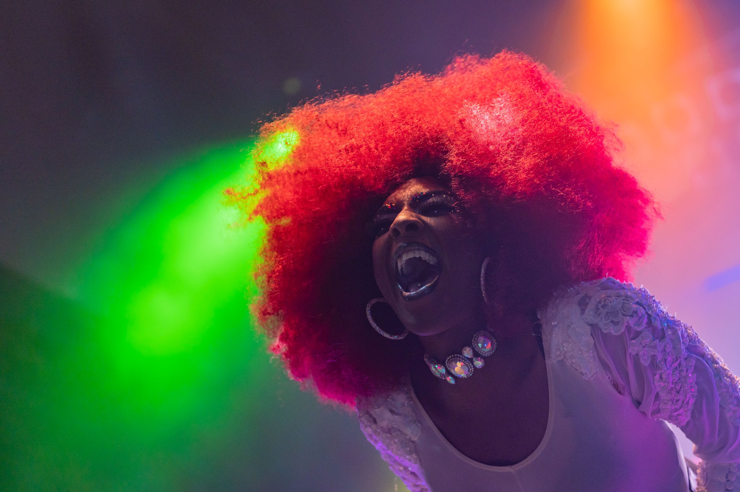 Hampton Roads drag queen Lola Monroe dances during the Fushia and Friends performance at NorVa's Studio 54 PrideFest Block Party in Norfolk, Va. on Friday, June 23, 2023. (Tess Crowley / The Virginian-Pilot) 