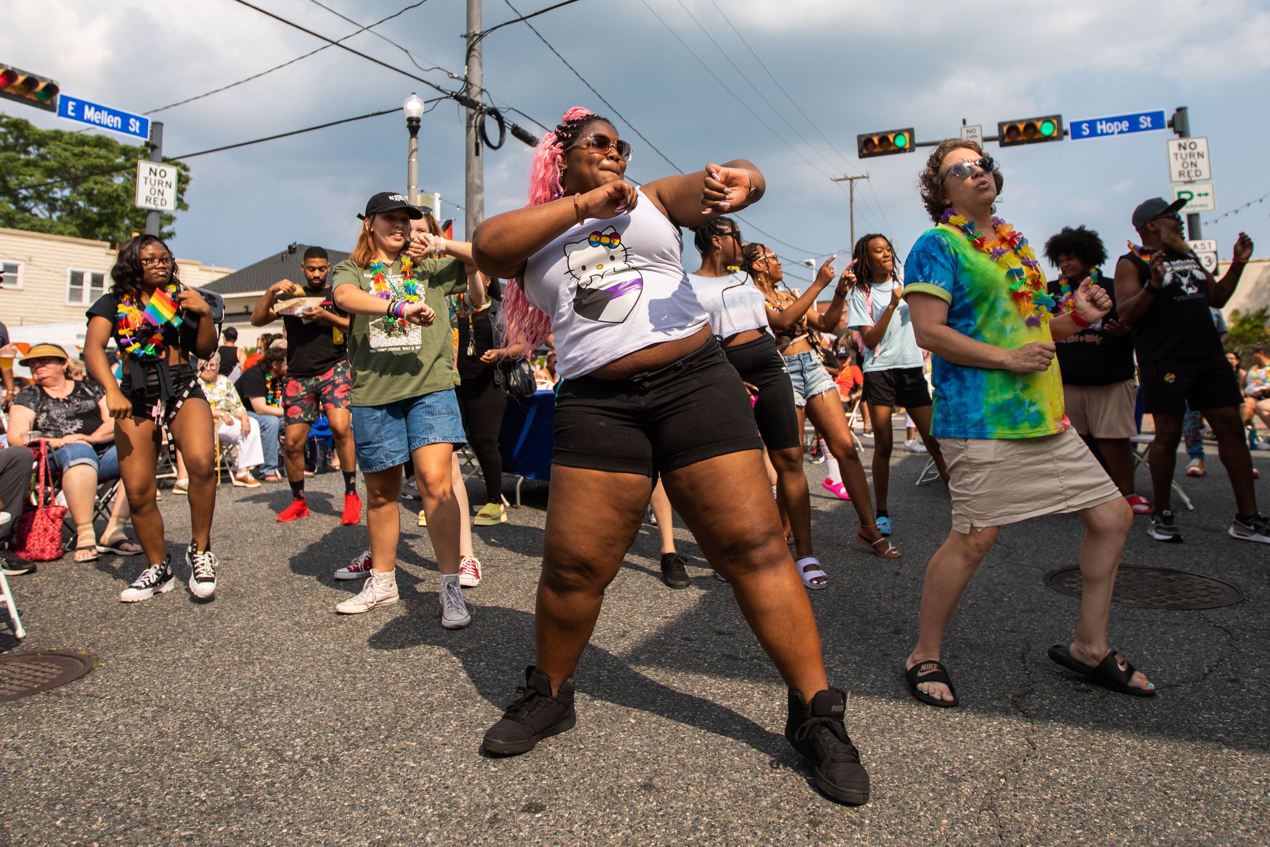  Mia Knowles-Davis, of Hampton, Va., center, dances at the Phabulous Phoebus Street Festival in Hampton, Va. on Saturday, June 17, 2023. (Tess Crowley / The Virginian-Pilot) 