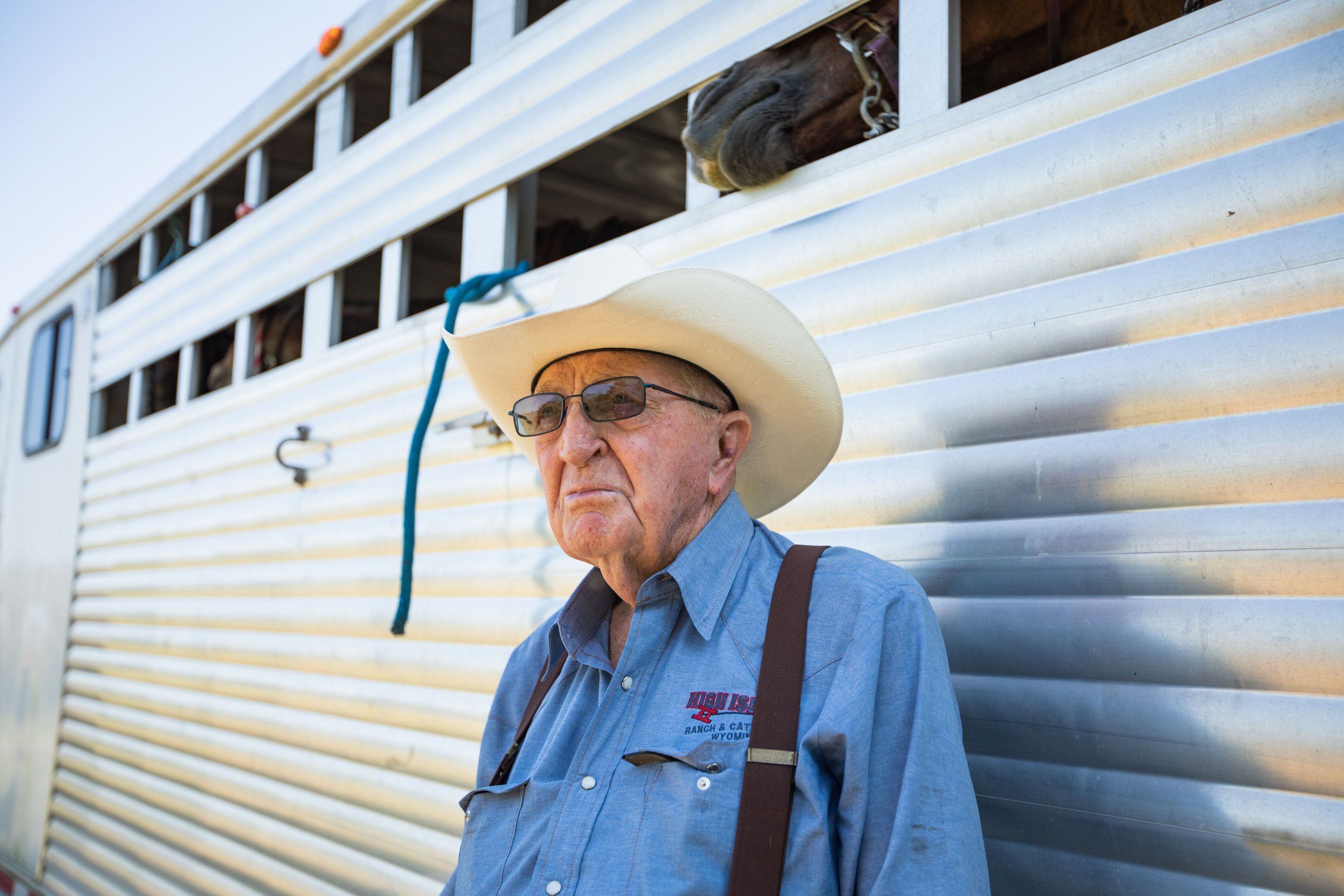  90-year-old Jack Brittingham, the oldest Saltwater Cowboy in the Chincoteague Volunteer Fire Company, poses for a portrait after rounding up ponies during the North Herd Roundup on the north end of Assateague Island, Virginia on Sunday, July 23, 202