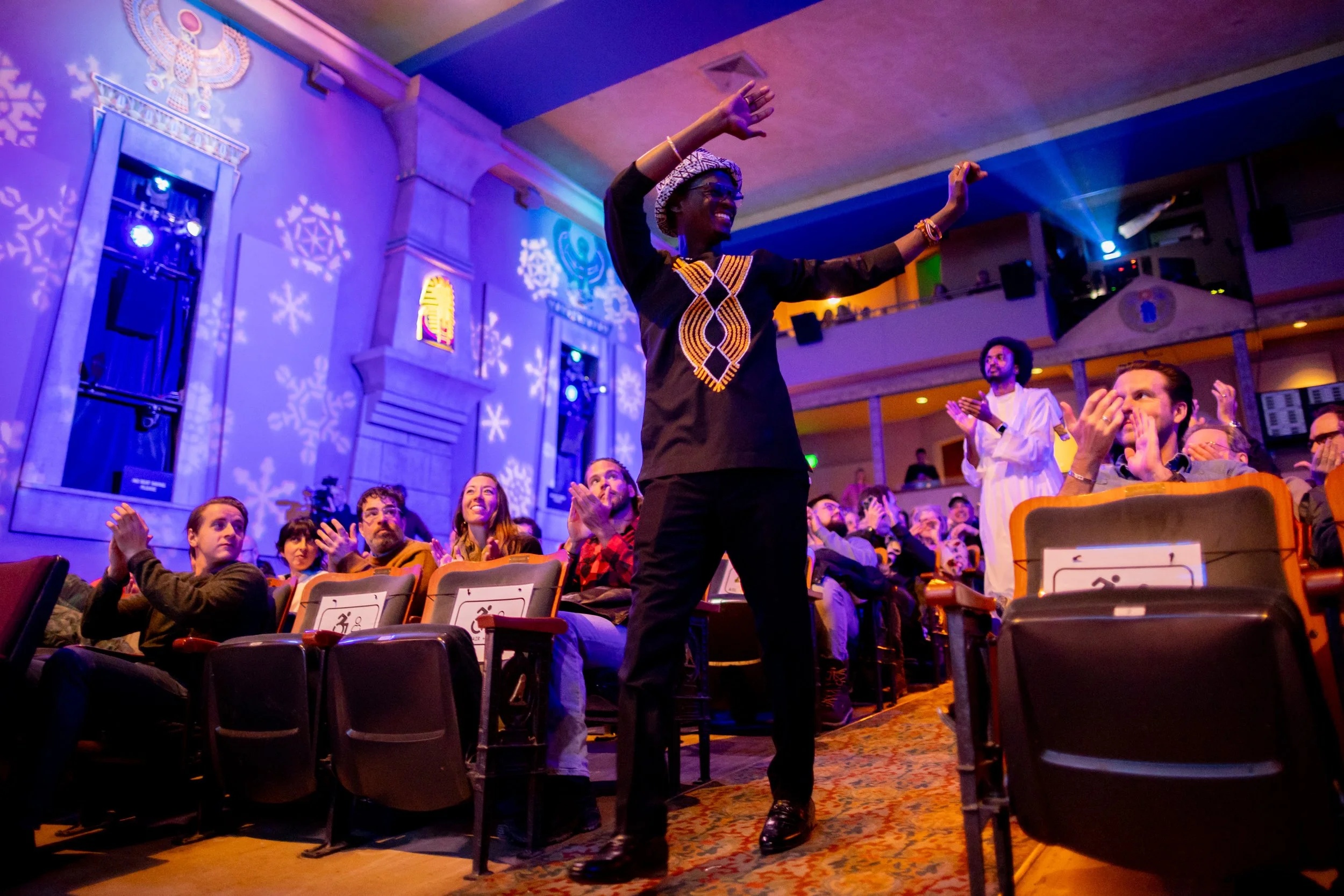  “Khartoum” Sudanese director Anas Saeed, center, and fellow directors look out at the audience before the world premiere of their documentary “Khartoum” at the Egyptian Theatre in Park City on Monday, Jan. 27, 2025. The four Sudanese directors trave