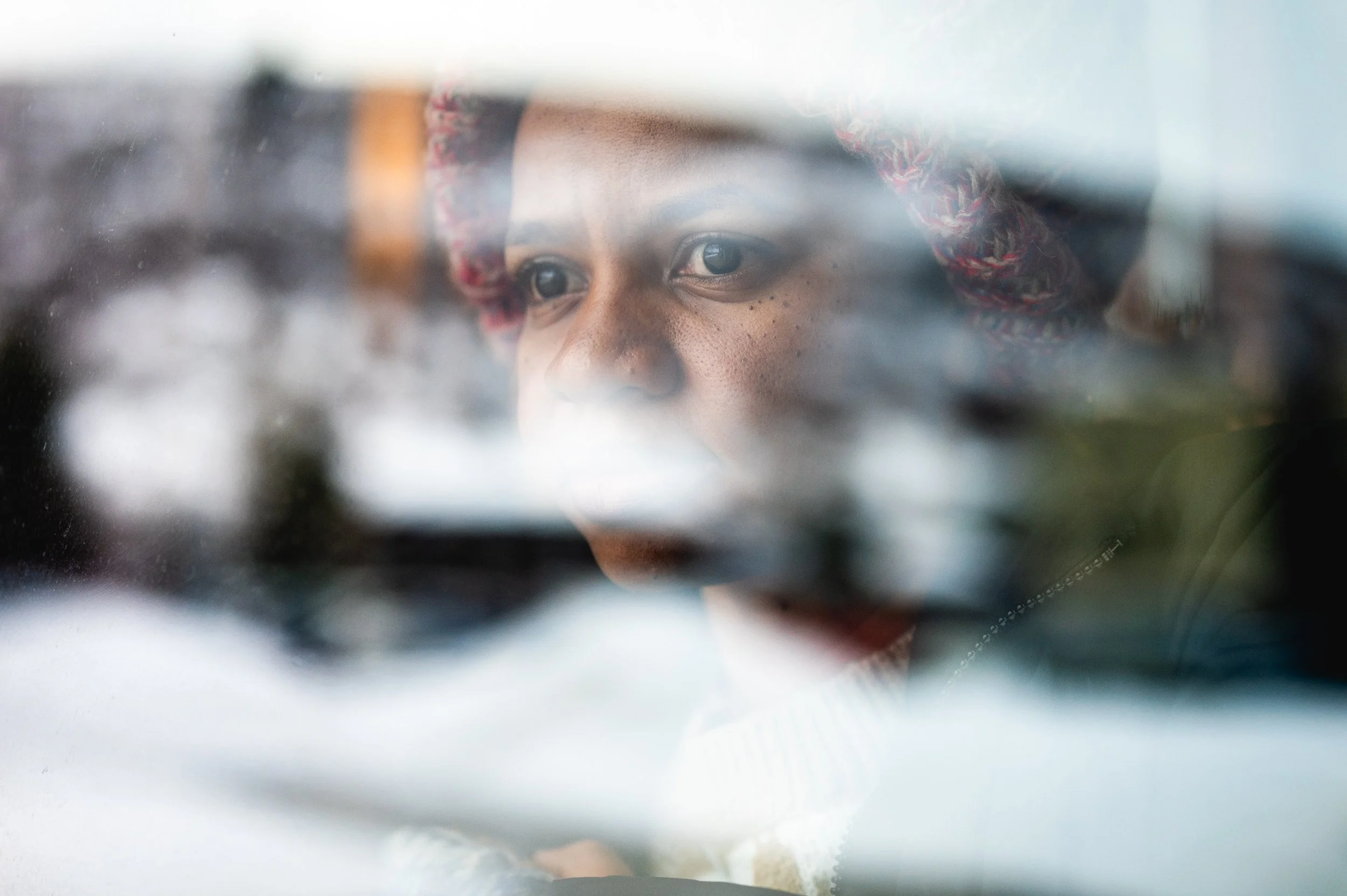  “Khartoum” director Rawia Alhag looks outside at the snow shortly after arriving to the Park City Hostel in Park City on Tuesday, Jan. 21, 2025. This is her and the three other Sudanese directors’ first time in the United States and first time seein