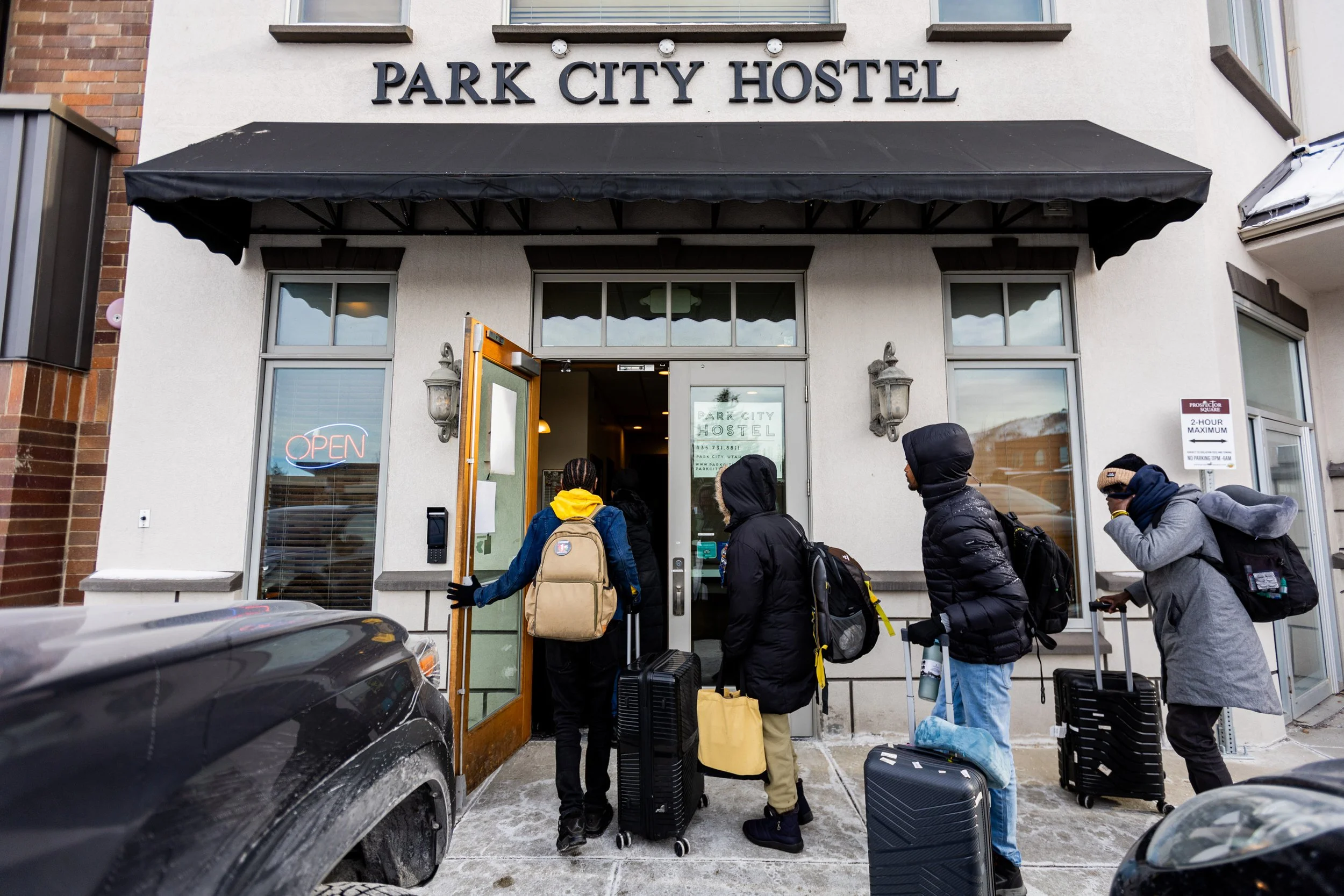  “Khartoum” directors Ibrahim Snoopy, Rawia Alhag, Timeea Mohamed Ahmed, and Anas Saeed, from left, arrive to the Park City Hostel in Park City on Tuesday, Jan. 21, 2025, for the world premiere of their film at the Sundance Film Festival. This is the
