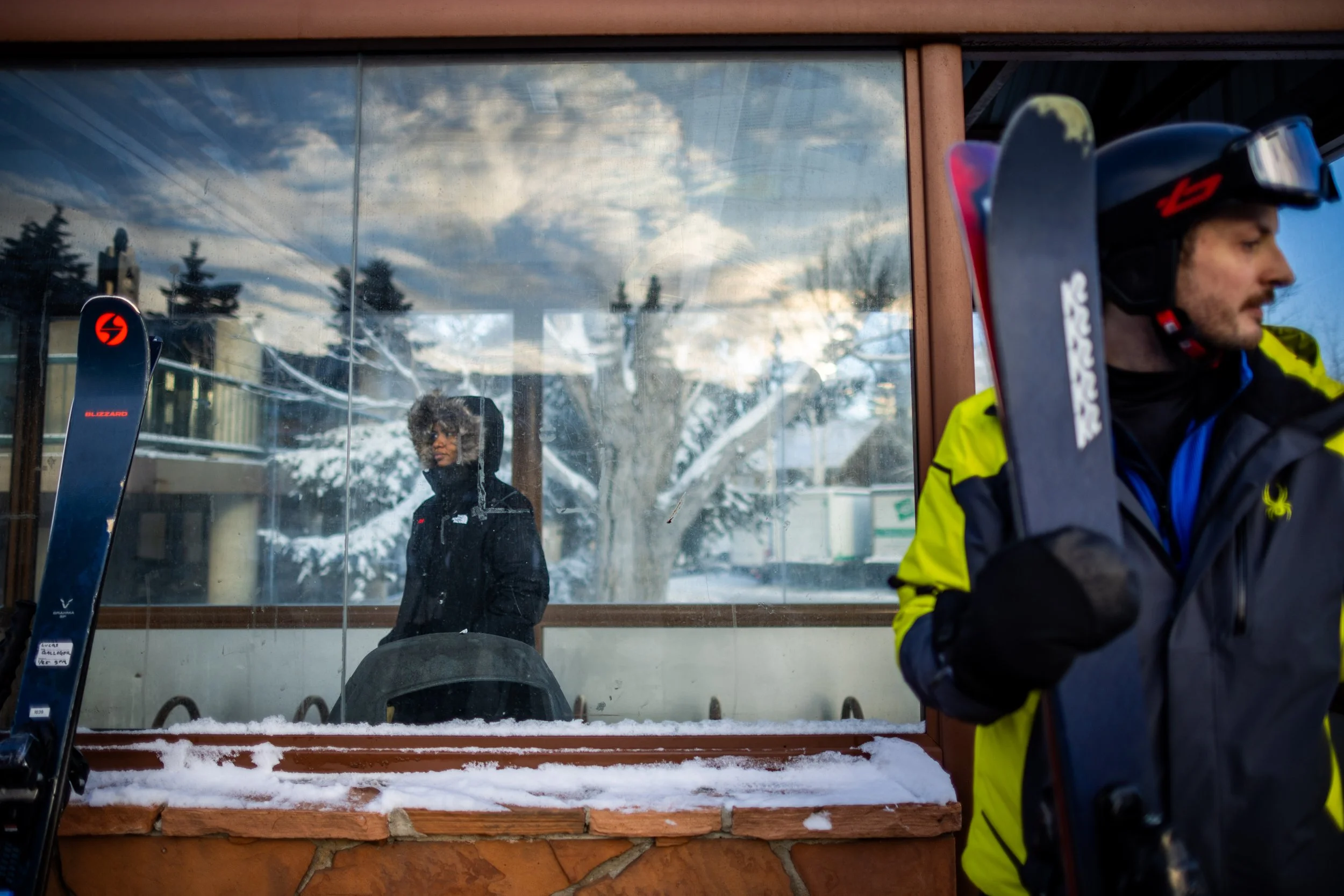  “Khartoum” Sudanese director Rawia Alhag, left, waits at a bus stop to head to a photo shoot at the L.A. Times Studio on Main Street with the other “Khartoum” directors in Park City on Sunday, Jan. 26, 2025. The four Sudanese directors traveled for 