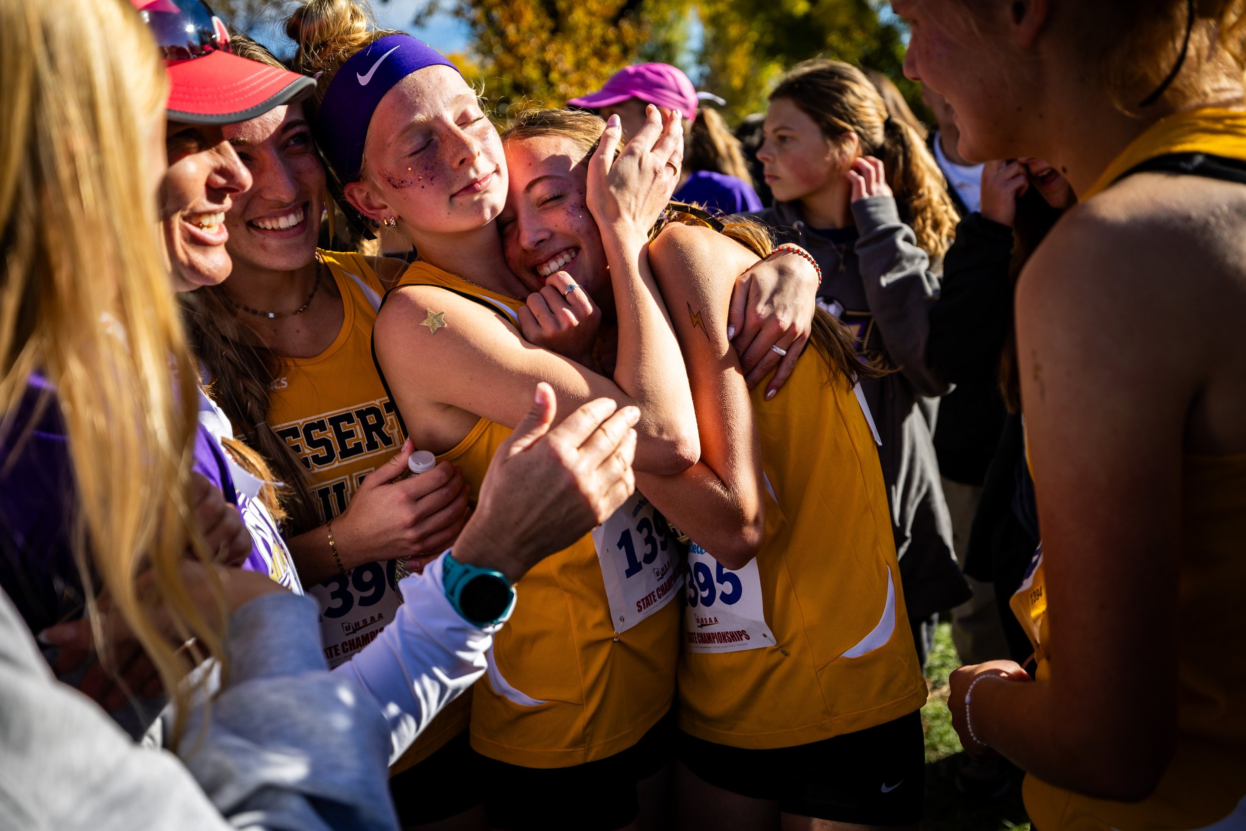  The Desert Hills team reacts after placing second in the 4A girls cross country state championships at Sugar House Park in Salt Lake City on Tuesday, Oct. 28, 2025.  