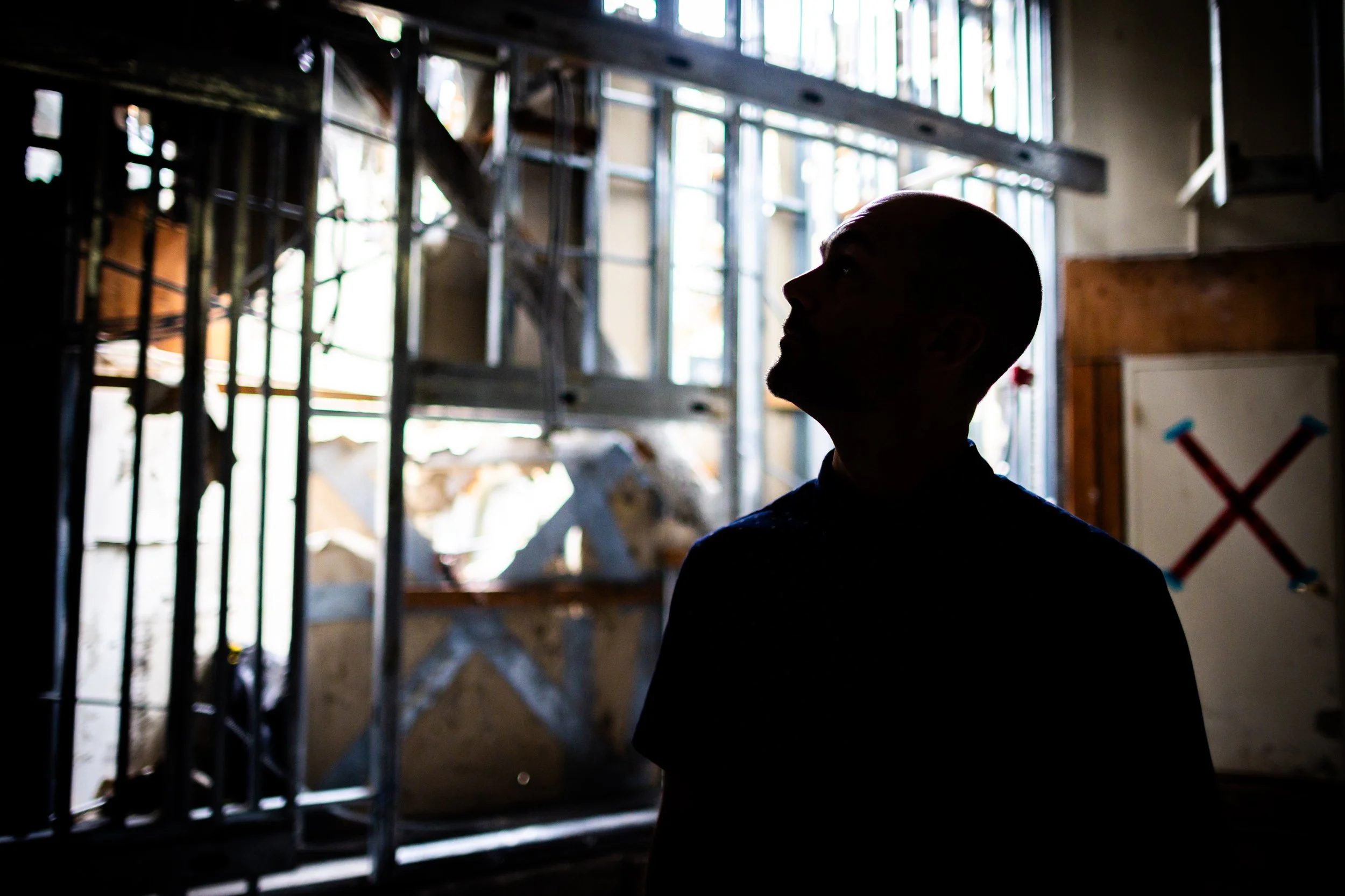  Pastor Justin Anderson of the Calvary Church of Pacific Palisades stands in the church’s sanctuary nearly six months after the sanctuary was severely damaged by the Palisades fire in the Pacific Palisades neighborhood in Los Angeles on Friday, June 