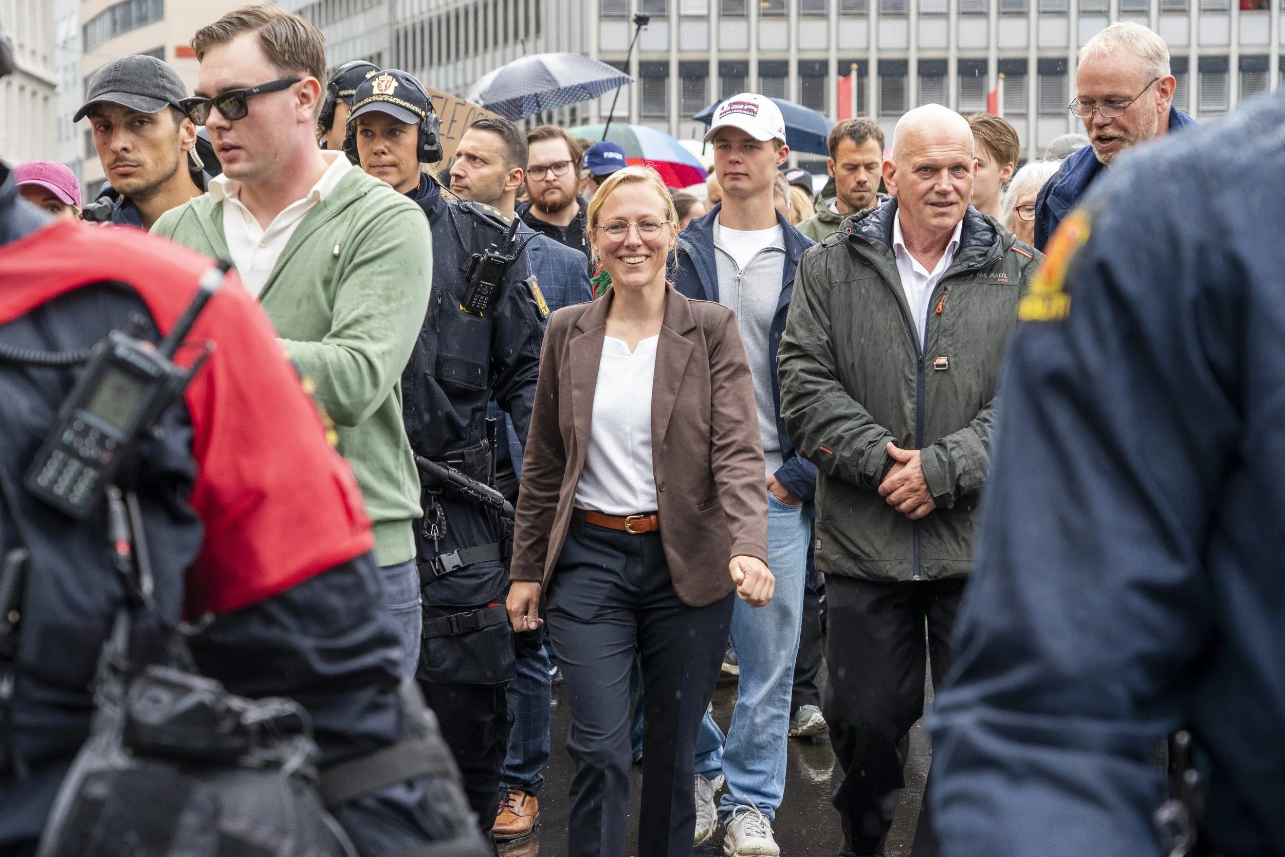 German MP Lena Kotré from the Alternative for Germany (AFD) party walking with members of Norgesdemokratene, a far-right conservative party