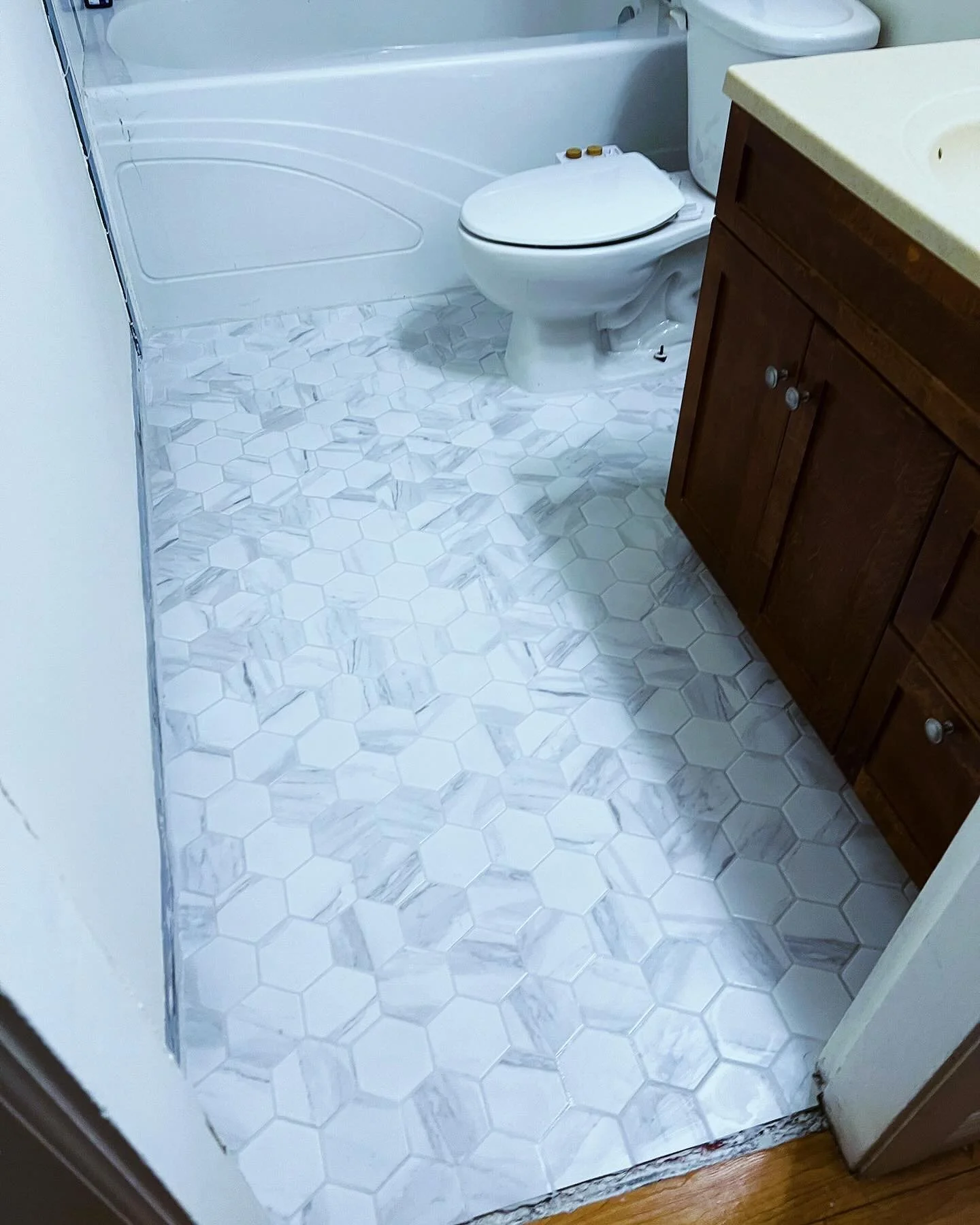 Bathroom update with some new floor tile. ✔️