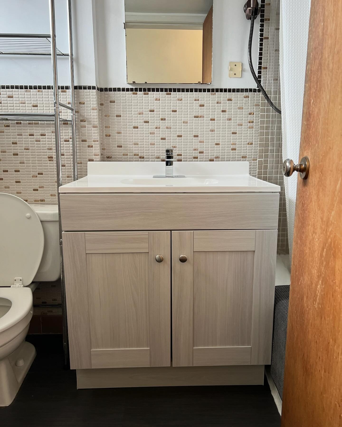 Sometimes you don&rsquo;t need much to completely change the feel of a room. We swapped out this old vanity and it made a huge difference for this bathroom.