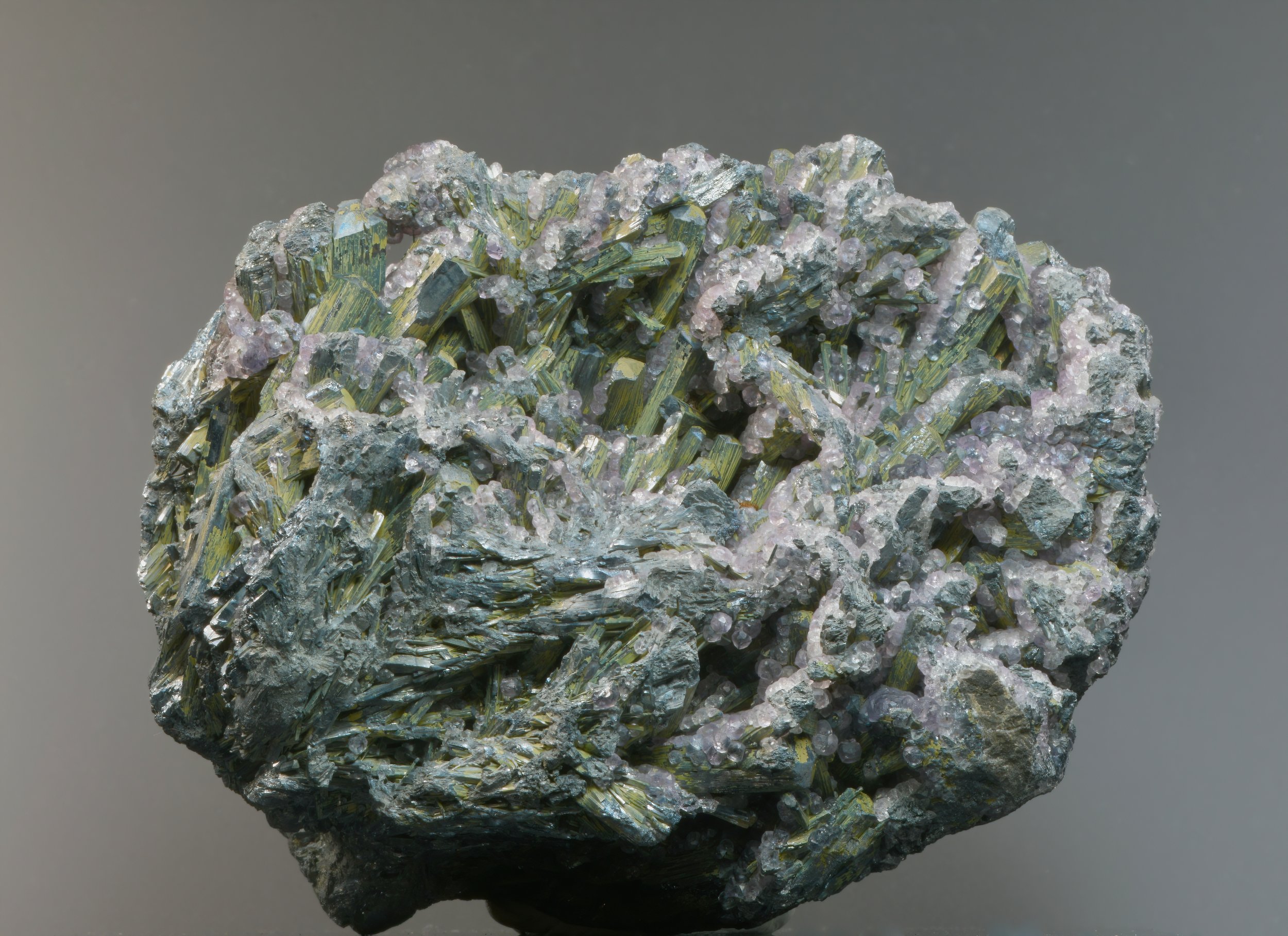 What this green mineral could be? it's harder than glass : r/rockhounds