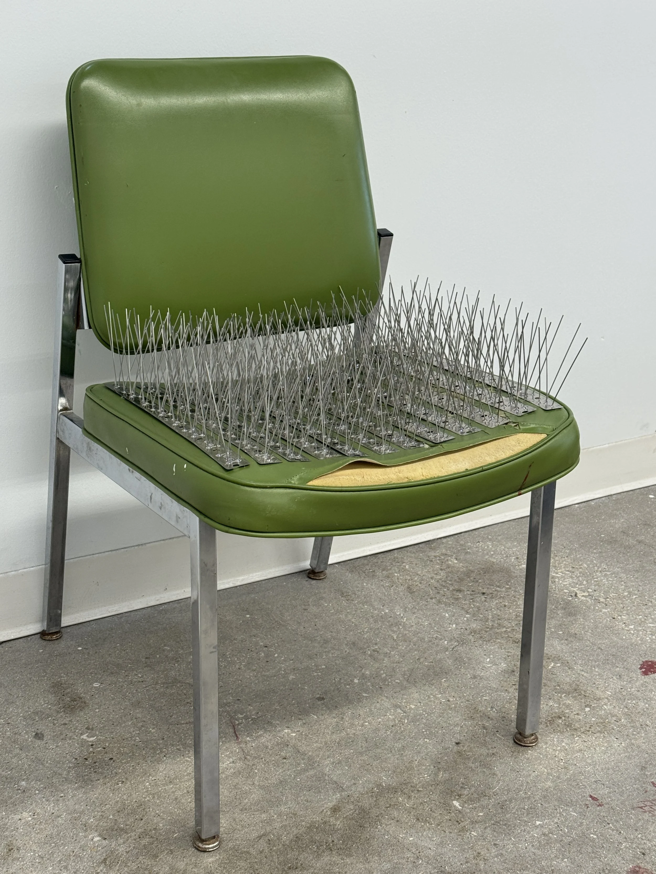 Waiting Room Chair | 2025 | Steel and vinyl chair, steel spikes