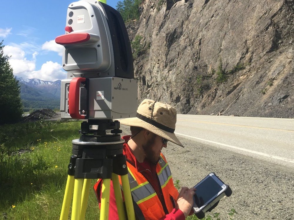Rapid Staff Member Andrew Lyda capturing detailed scans of rockslope activity following the 2018 Anchorage Alaska Earthquake using the Maptek LR3.