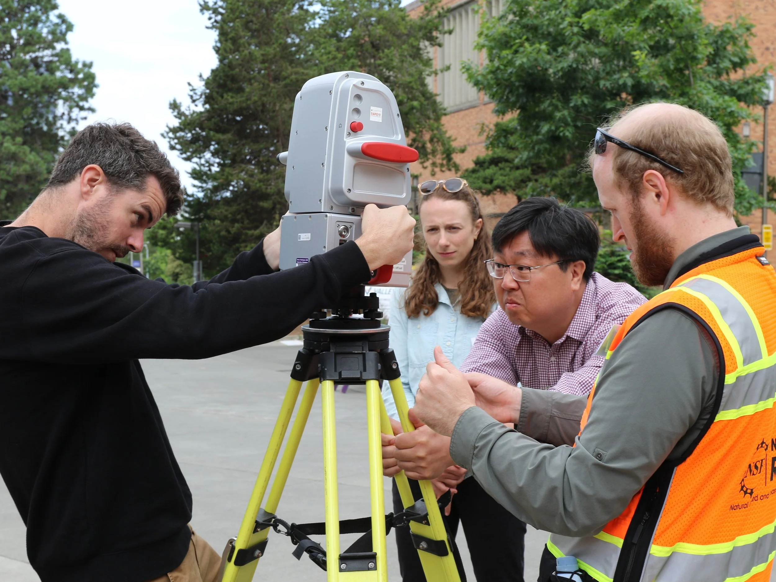Workshop attendees set up equipment at the RAPID Facility workshop