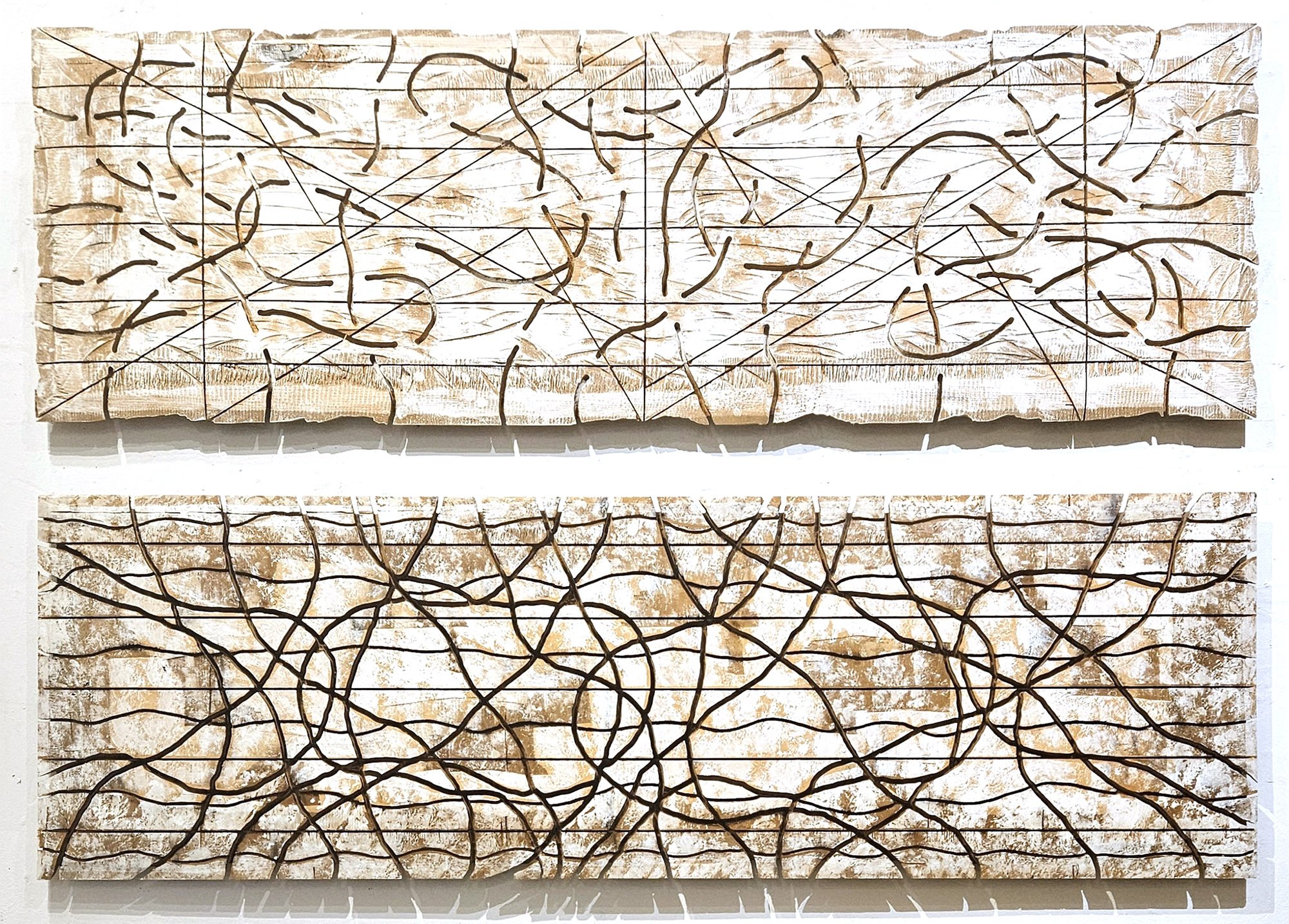 Mario Kon, Letting Go 1 & 2, cut, carved, burned, painted wood, 18"x57" each