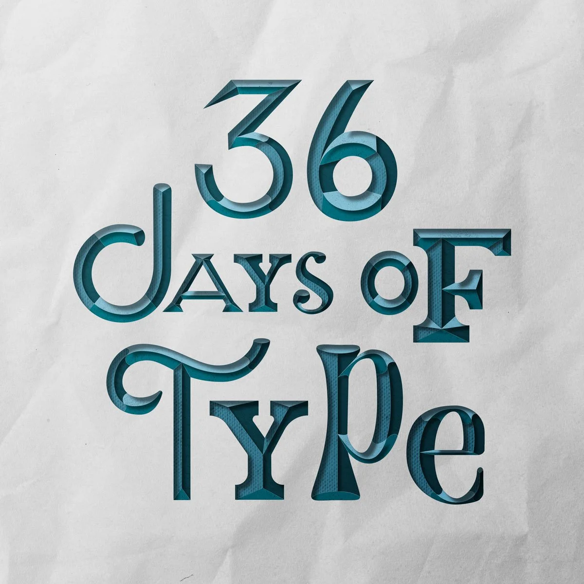 The words "36 Days of Type" cut out of paper
