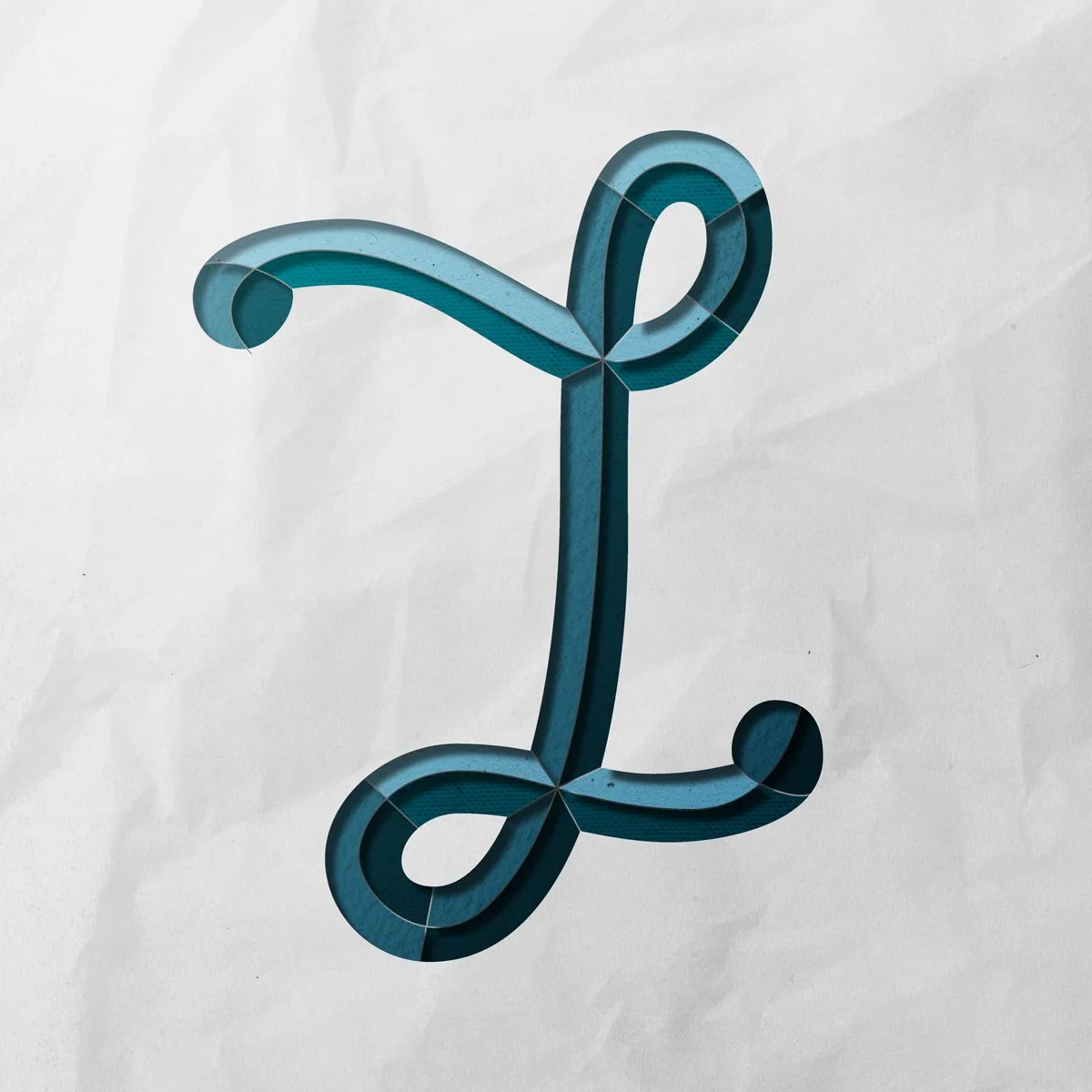 Script, capital letter L cut out from paper