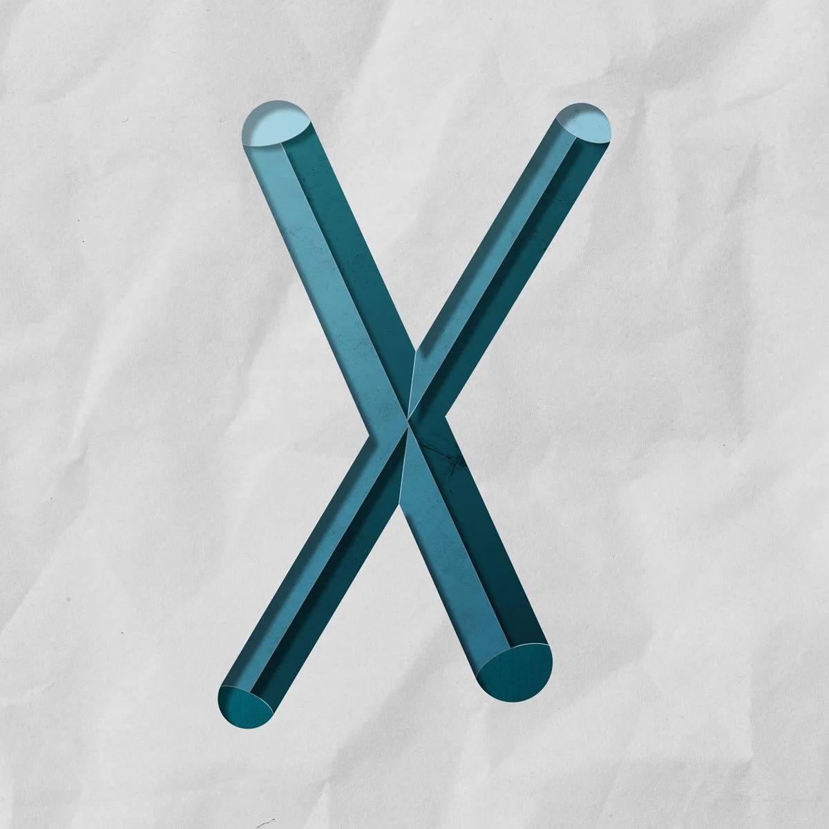 Letter X cut from paper