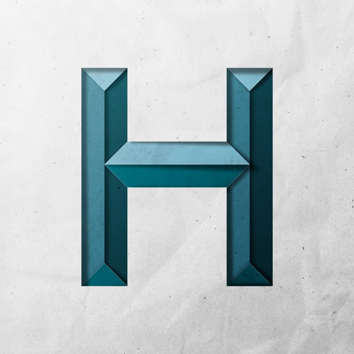 Capital letter H cut out from paper