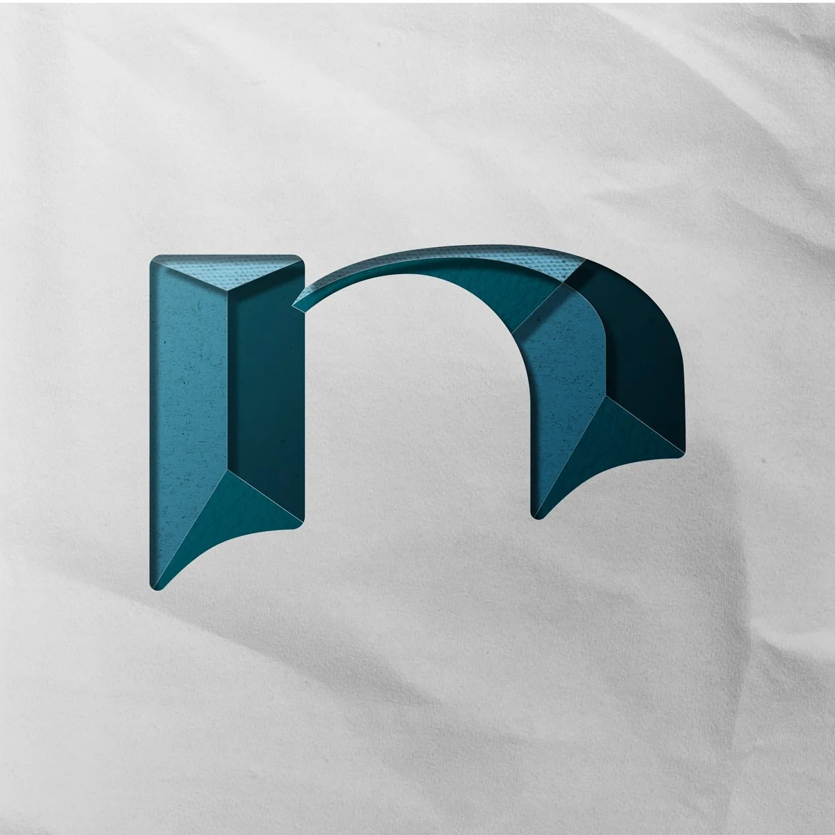 Lowercase letter n cut out from paper