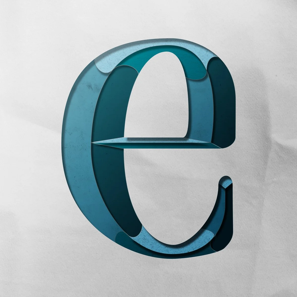 Lowercase letter e cut out from paper