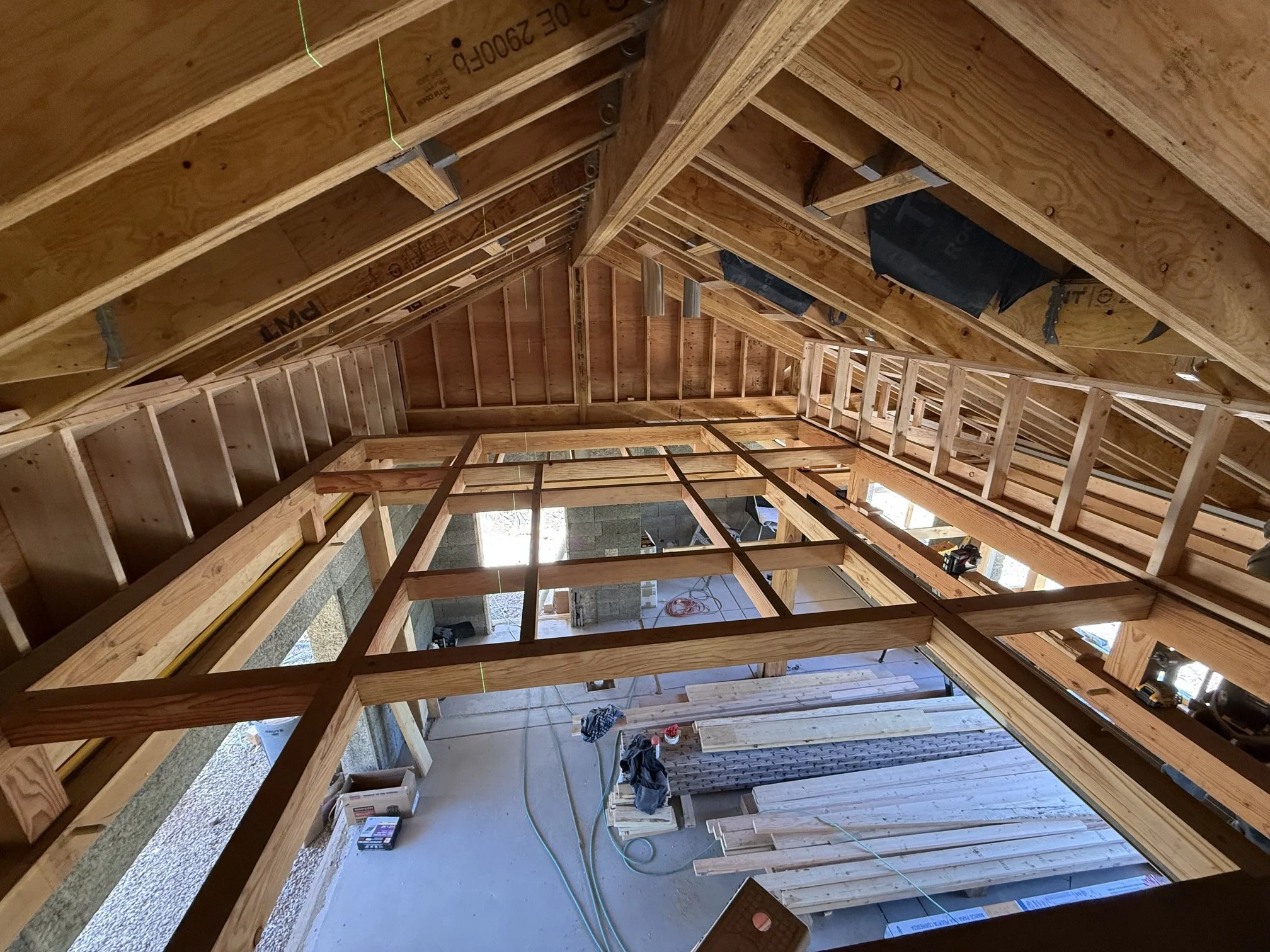 Exposed timber frame ceiling with skylights and Faswall