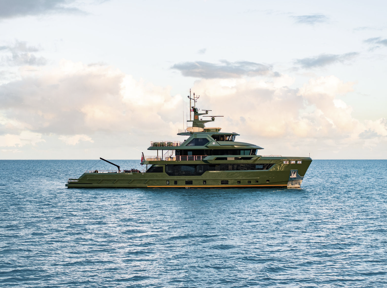 A dark green yacht with healthy interior finishes